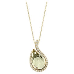 Quarzo menta Sunita Nahata 6.07ct. Ciondolo in oro giallo 14 carati con diamante.