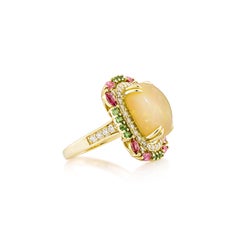 Sunita Nahata: opale, tsavorite, tormalina 5,45 ct. Anello in 18KYG con diamante.