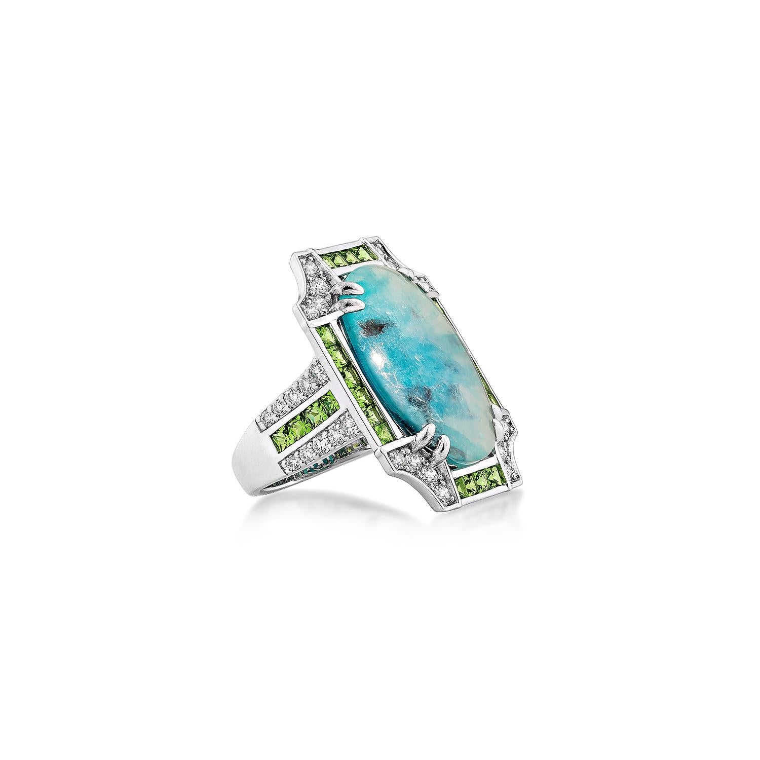 A captivating statement ring featuring an exquisite Paraiba tourmaline centerpiece, celebrated for its vivid oceanic hue and unique natural inclusions. Encased in a shimmering halo of brilliant-cut diamonds, this masterpiece is further accentuated