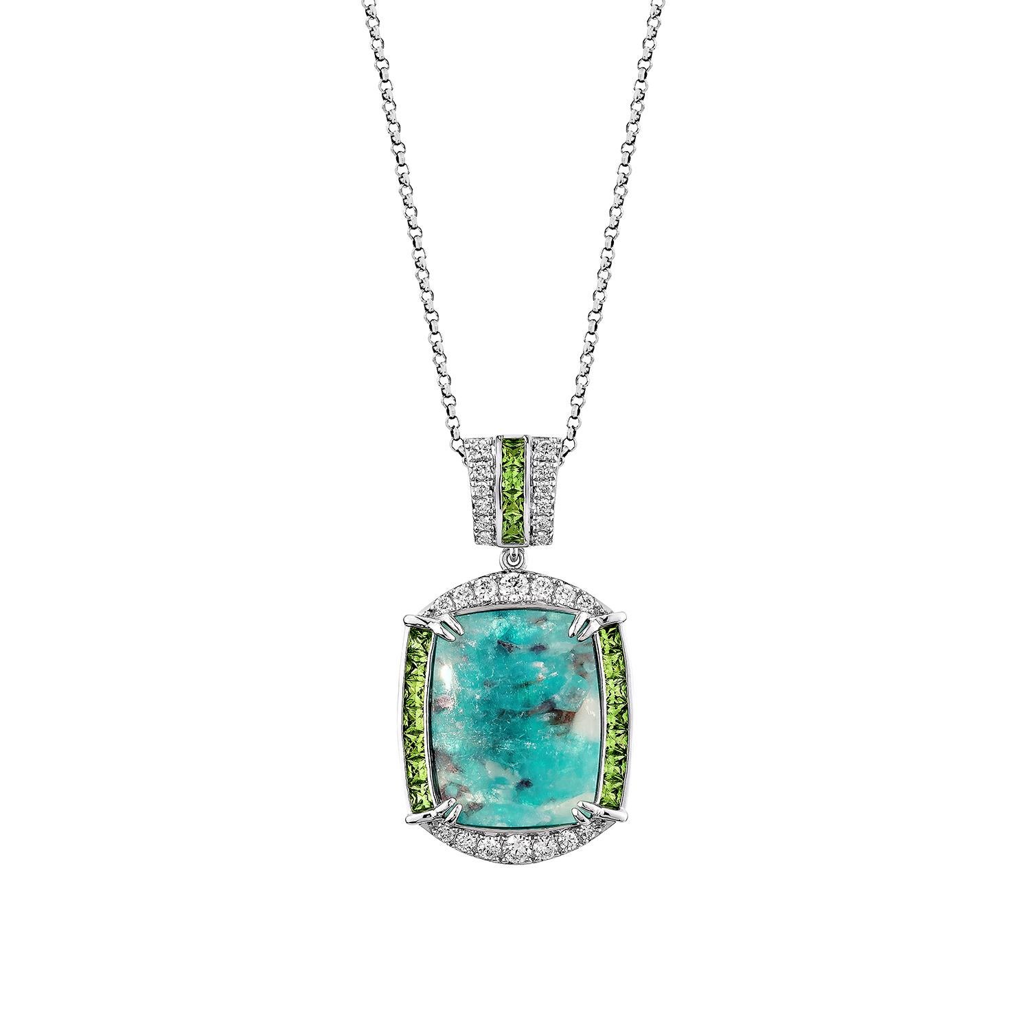 A captivating statement pendant featuring an exquisite Paraiba tourmaline centerpiece, celebrated for its vivid oceanic hue and unique natural inclusions. Encased in a shimmering halo of brilliant-cut diamonds, this masterpiece is further