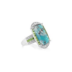 Sunita Nahata Paraiba 7.38ct. Fancy Ring in 18KWG with Tsavorite and Diamond.