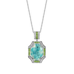 Sunita Nahata Paraiba 8.17ct. Pendant in 18KWG with Tsavorite and Diamond.