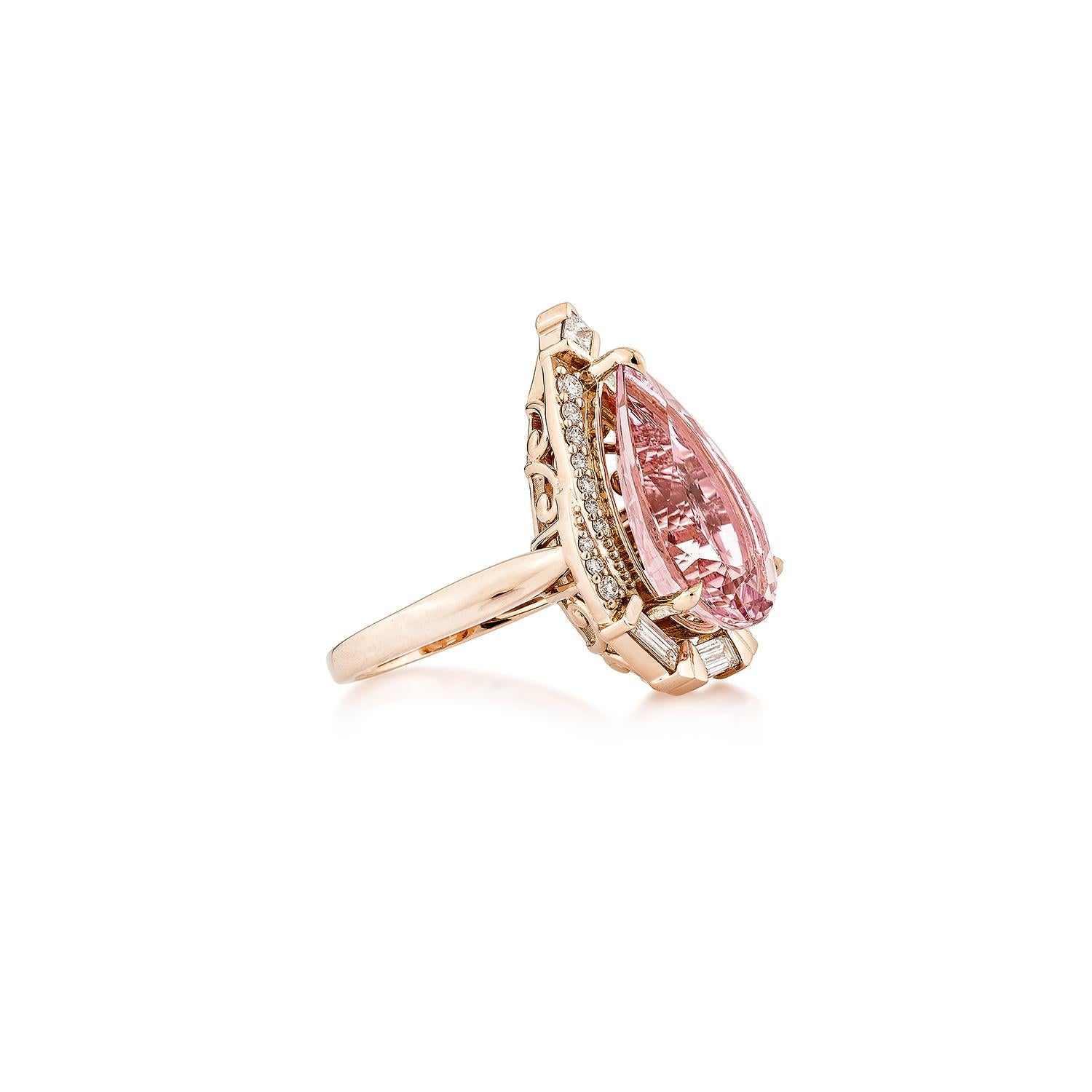 A graceful 18K rose gold ring featuring a pear-shaped pink morganite, accented with sparkling diamonds for a touch of timeless elegance.

Pink Morganite Fancy Ring in 18KRG with Diamond.

Pink Morganite: 5.63 carat, 17X10X6.5mm size, Pear shape.
