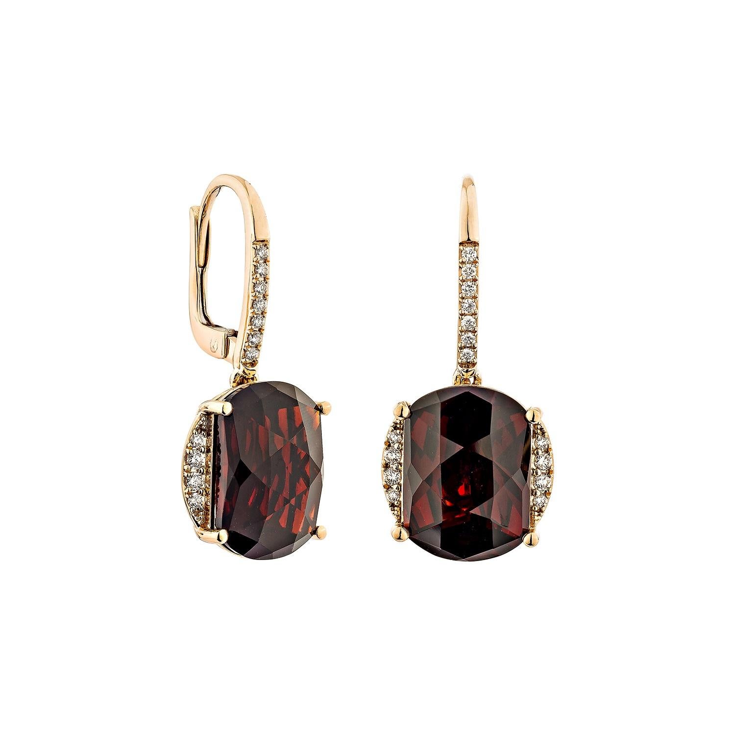 Presented A Pair of Red Garnet Earrings is perfect for people who want to wear it to any occasion or celebration. Its captivating garnet, and white diamond set in 14karat rose gold, intended to charm hearts and elevate any special occasion.

Red