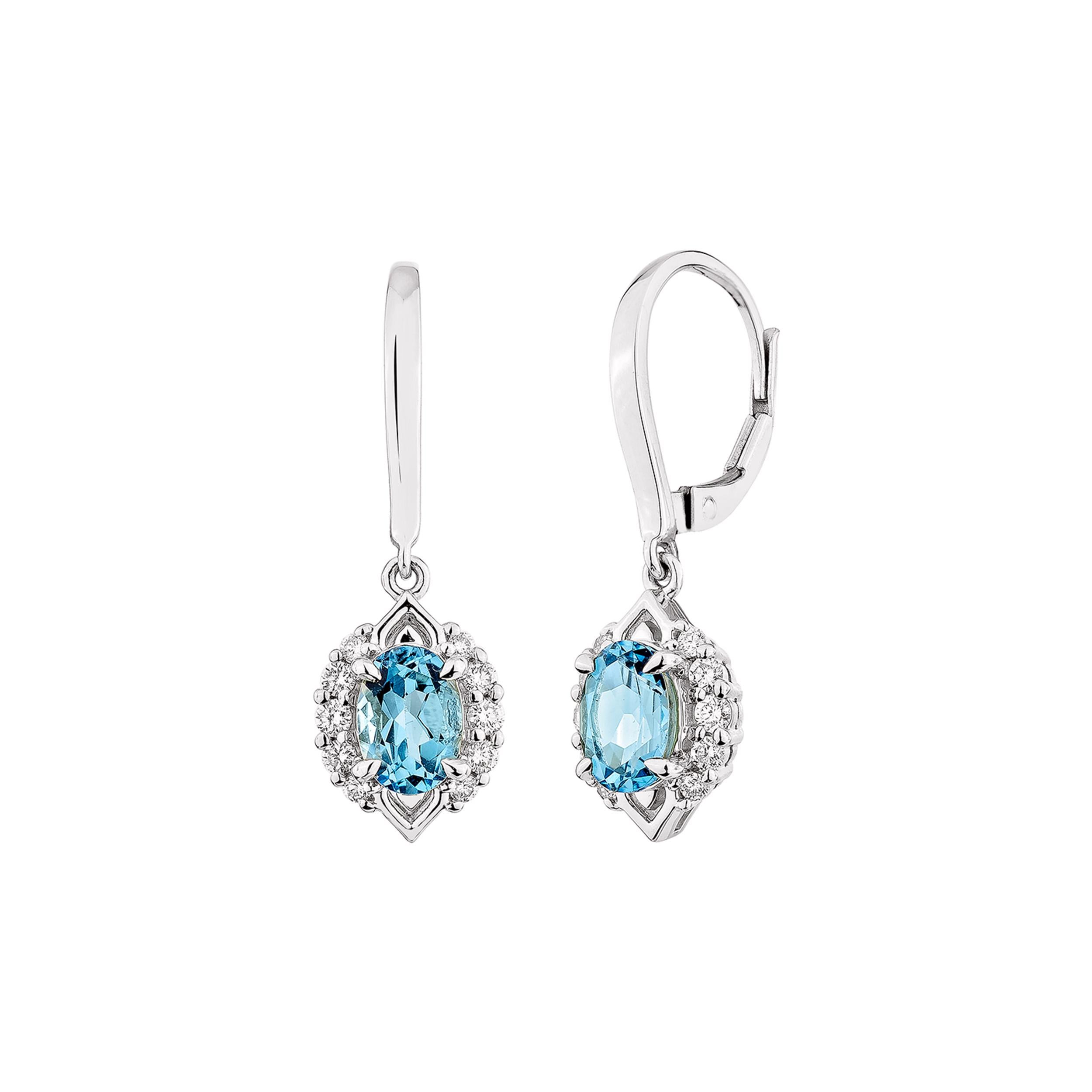 Taglio ovale Sunita Nahata Topazio Blu Svizzero 1.79ct. Orecchino a goccia in 14KWG con diamante. in vendita