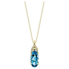 Sunita Nahata Topazio Blu Svizzero 3.93ct. Ciondolo in 14KYG con diamante bianco.