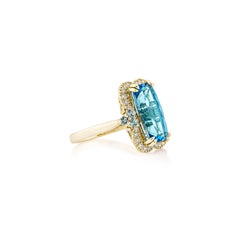 Sunita Nahata Swiss Blue Topaz 4.79ct. Fancy Ring in 14KYG with Diamond.