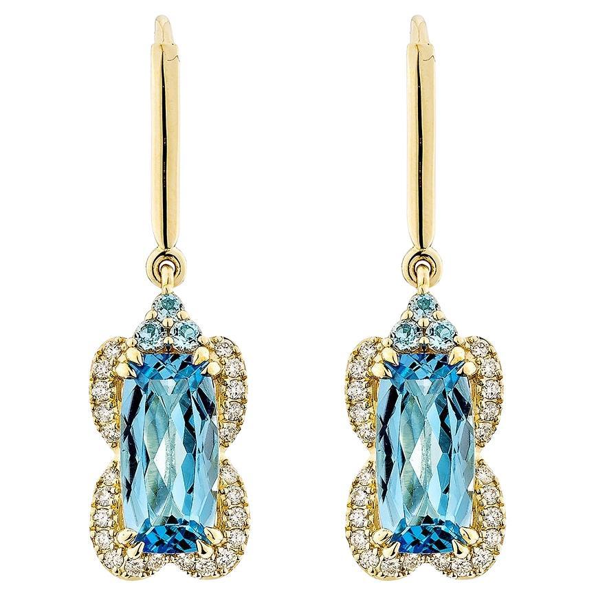 Sunita Nahata topaze bleue suisse 5.62 carats. Boucle d
oreille pendante en 14KYG avec diamant.