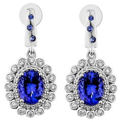 Sunita Nahata Tanzanite e Zaffiro 2.82ct. Orecchini a goccia in 18KWG con diamante.