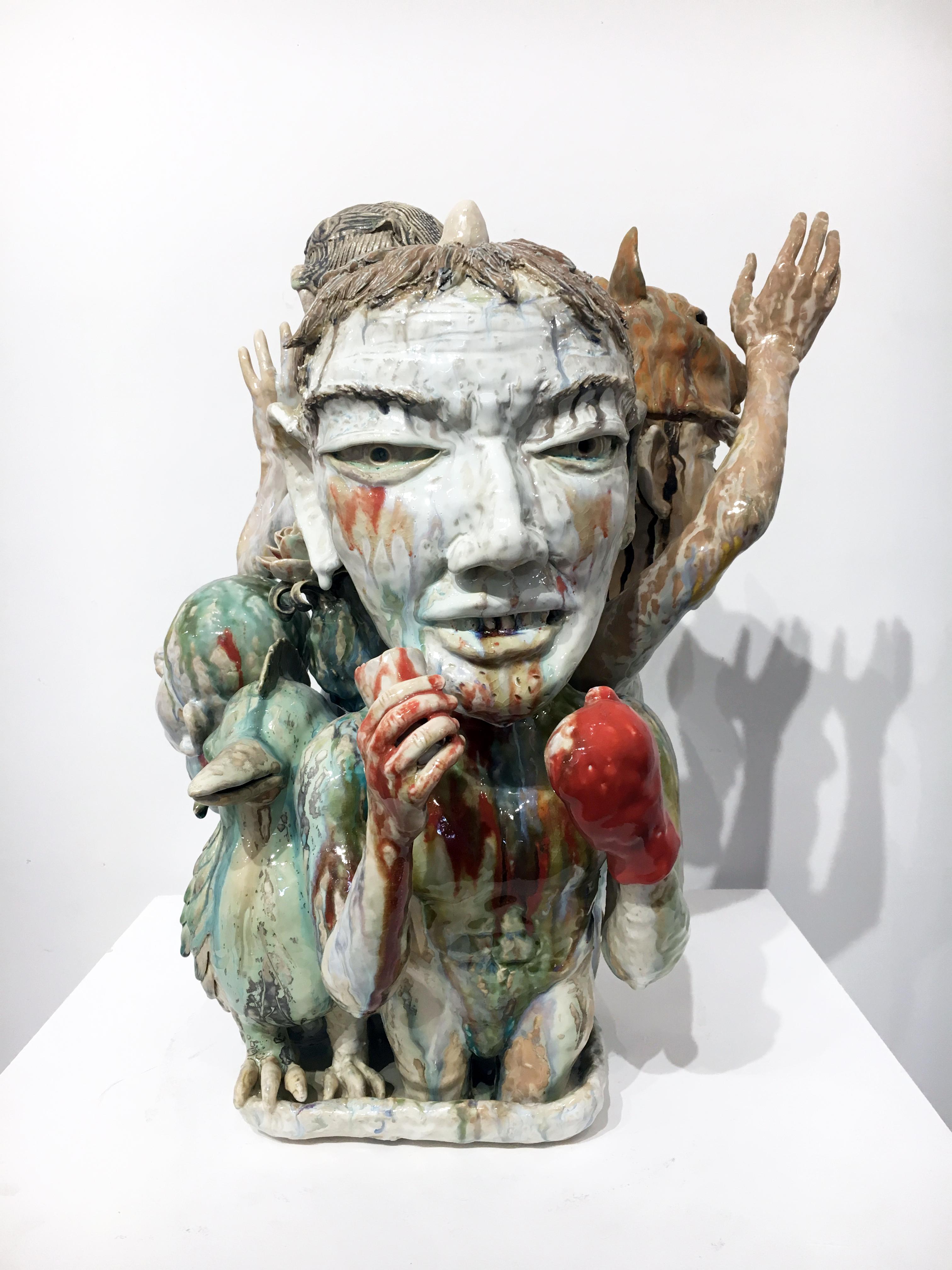 The ceramic sculptures of SunKoo Yuh are composed of tight groupings of various forms including plants, animals, fish, and human figures. While Korean art, Buddhism, and Confucian beliefs inform some aspects of his imagery, implied narratives that