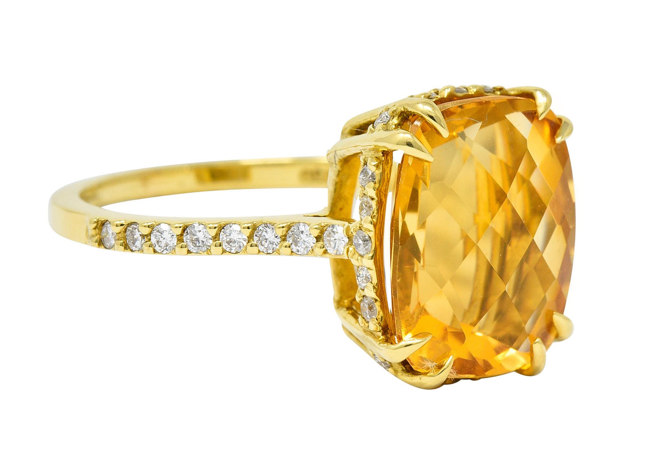 Centering a mixed checkerboard cushion cut citrine measuring approximately 12.0 x 10.0 mm

Basket set with split prongs; displaying transparent medium light yellowish orange color

Accented throughout by round brilliant cut diamonds weighing in
