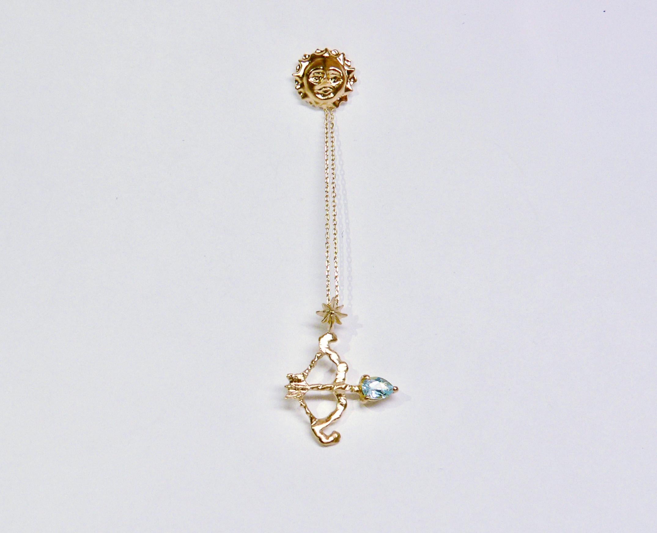 From the night, moon shot the arrow to dawn bright and sunny smiling Sun.

This single earring is made of Sterling Silver with 18 Karat gold plated as one of the Night Collection. Arrow is with blue topaz. 

The size is about 75mm length, 12mm