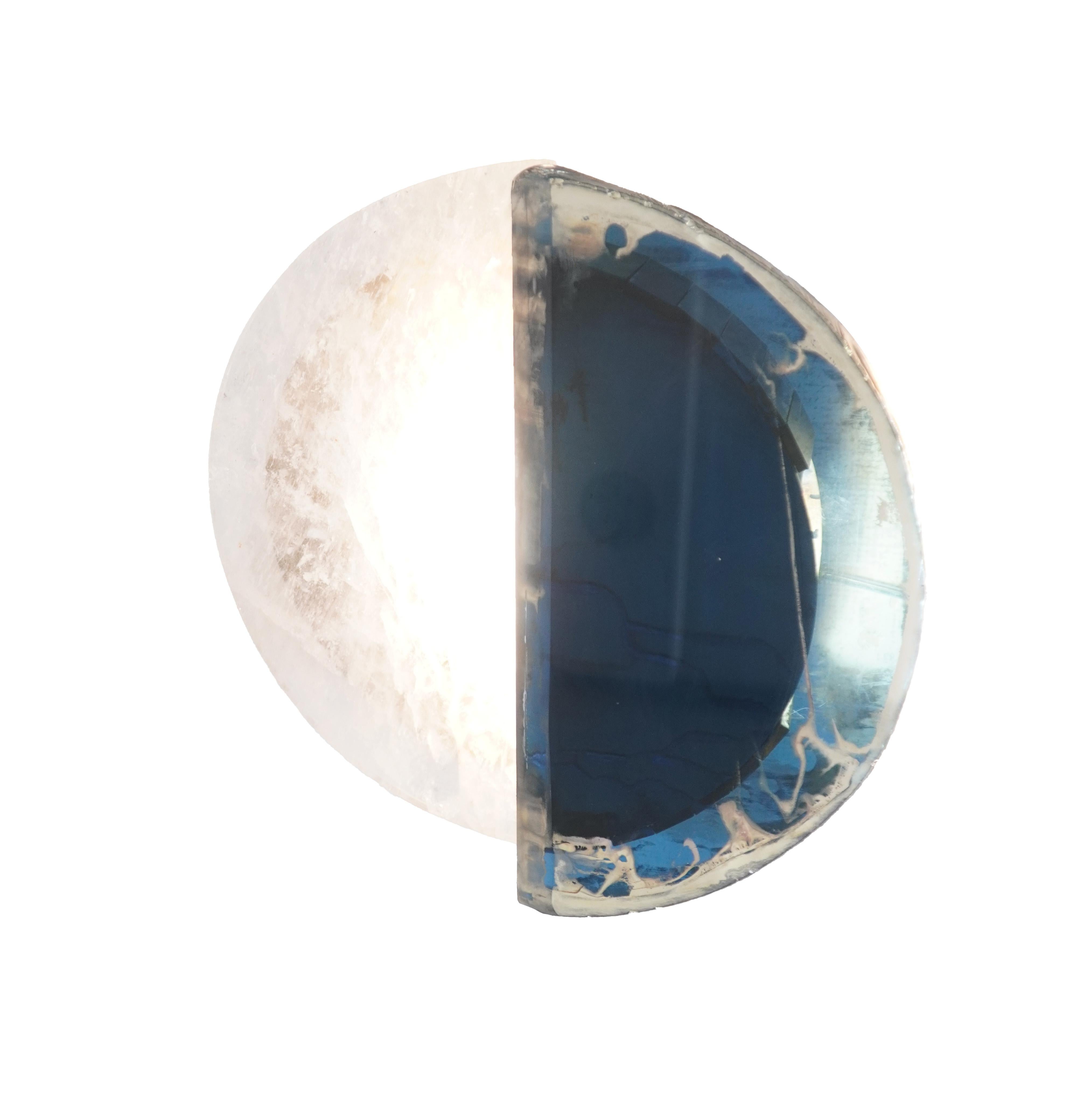 Sunnymoon is born.
blue silvered - satin silvered glass

Inspired by the clear sun light and the calm moon light, that are combined here.
From the classic silhouette of our iconic Two-be and Two-free then, Sunnymoon, with its delicate shape and