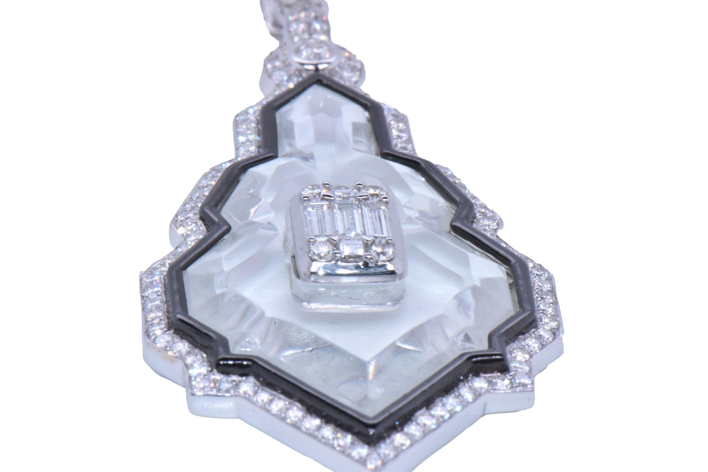 Sunray Crystal Diamond PendantIn 18k White Gold

Beautiful One of a Kind Art-Deco Style Pendant, with Diamond border and a Baguette Diamond Center Setting on top of a Sunray Crystal 

Total Crystal Carat Weight: 2.73 Carats (total one stone)
Round