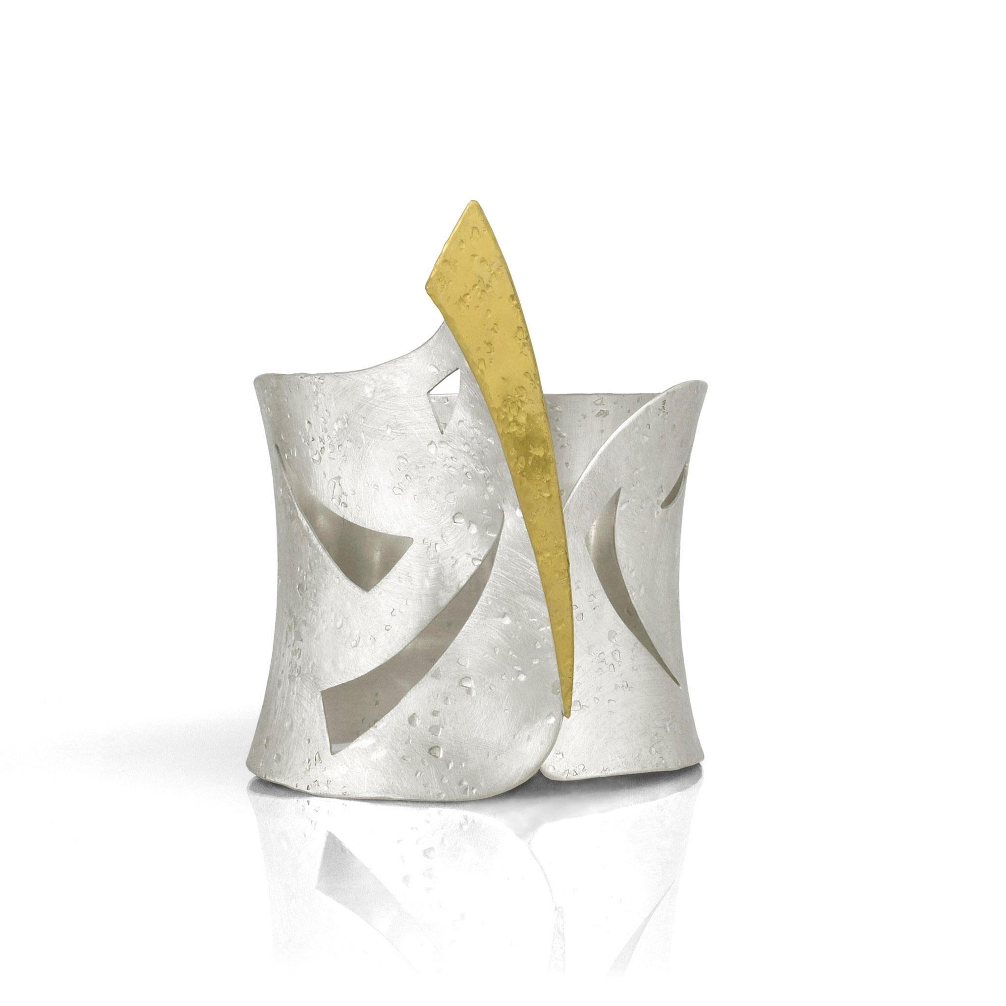 Sunray Cuff 935 Silver and 22K Gold Cuff one of a kind Sculptural Jewelry by Maria Blondet
*There is one more piece available ready to be shipped

This statement cuff is a beautiful example of balance within the shapes. Instead of creating stark