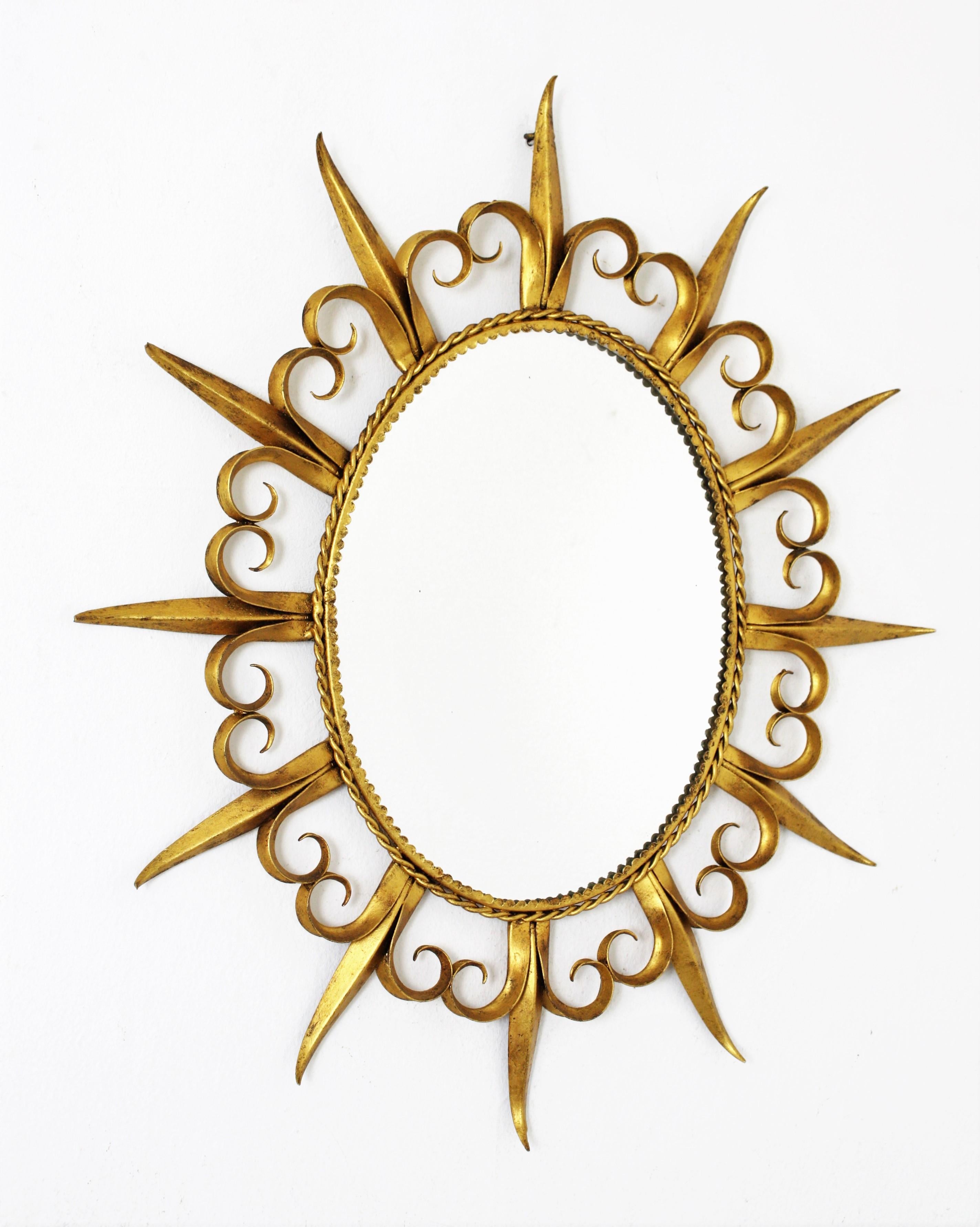 Spanish Sunburst Eyelash Oval Mirror in Gilt Wrought Iron For Sale