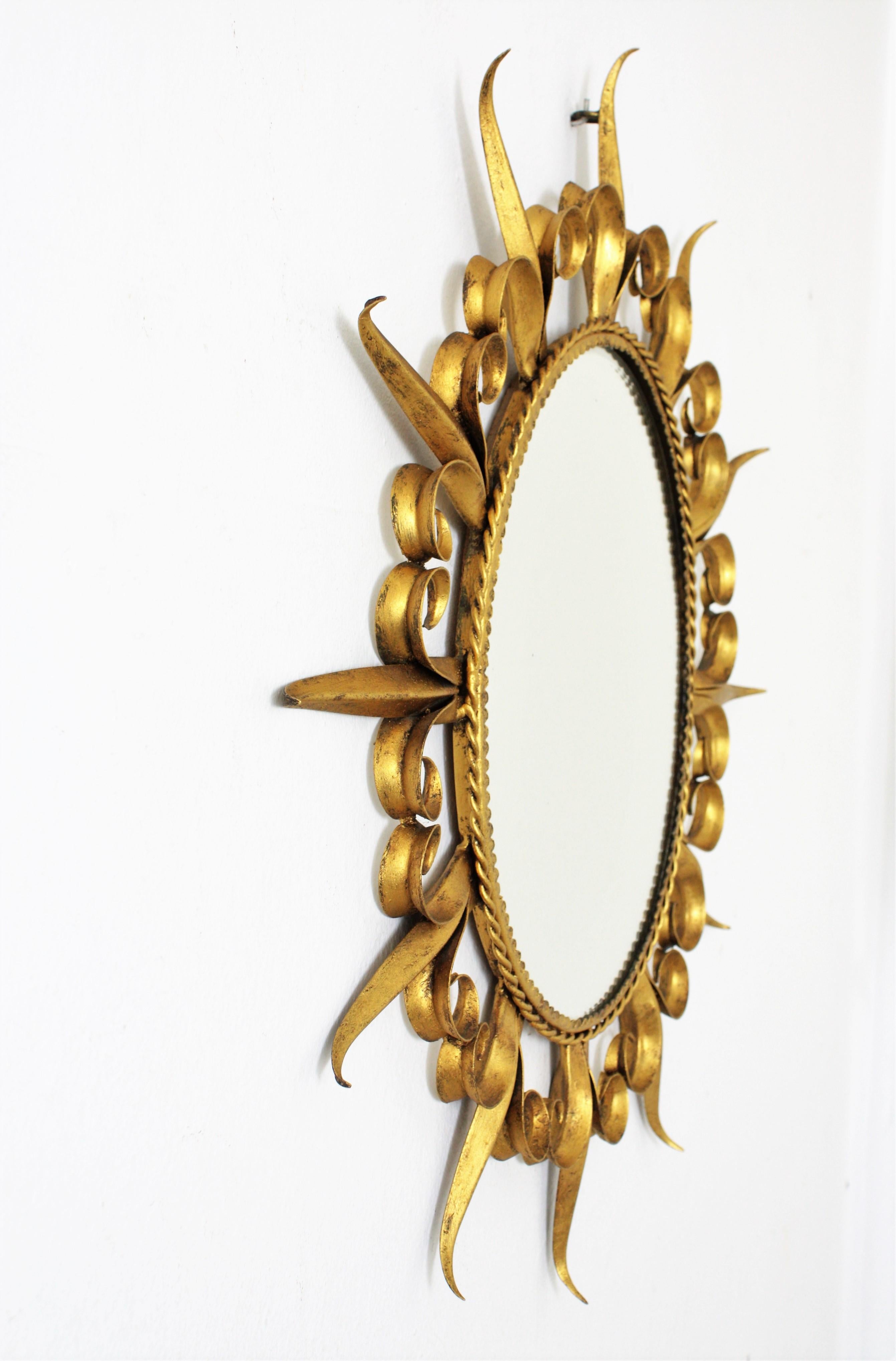Metal Sunburst Eyelash Oval Mirror in Gilt Wrought Iron For Sale