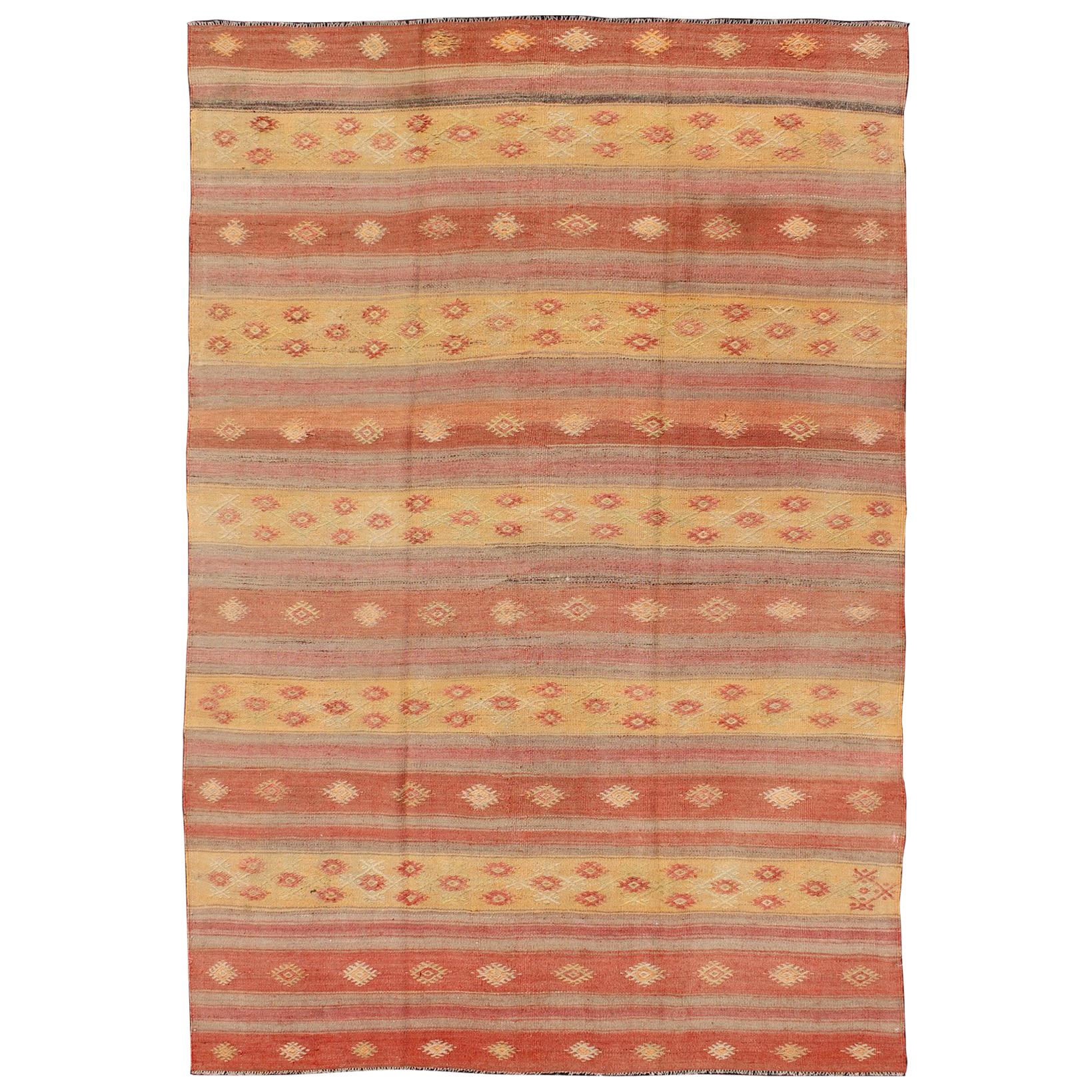 Sunset-Colored Vintage Turkish Kilim Rug with Striped Design and Geometrics