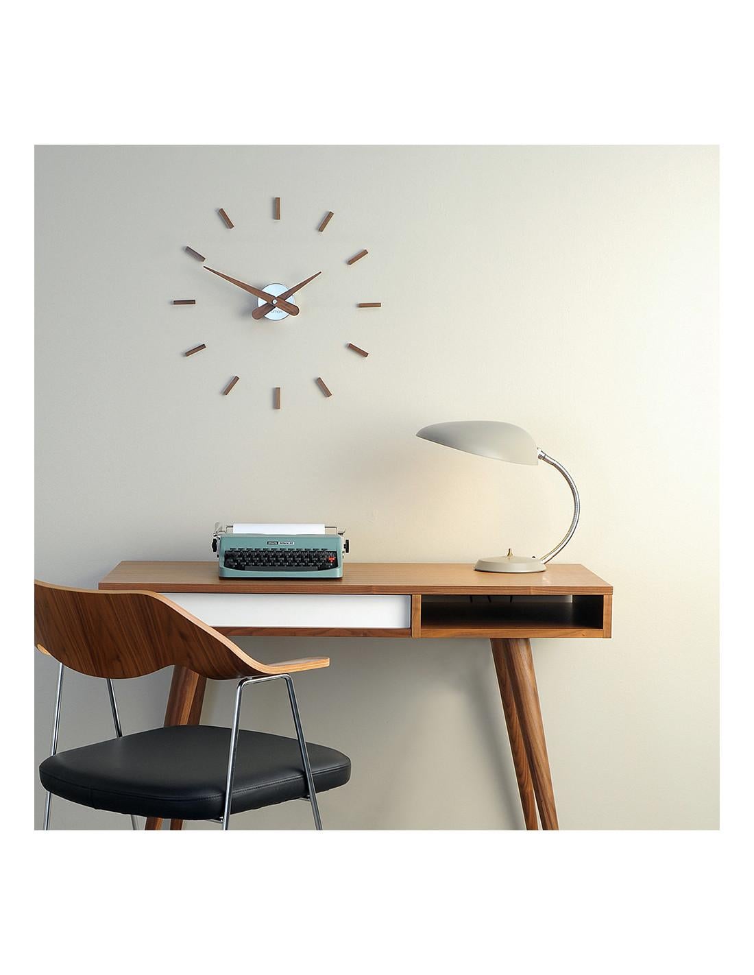 The wall clock is an object that more than giving time elegantly it also decorates any space or room.
Sunset i wall clock: Wood and Chrome
Each clock is a unique handmade piece.
California Residents: Prop 65 regulations.


 