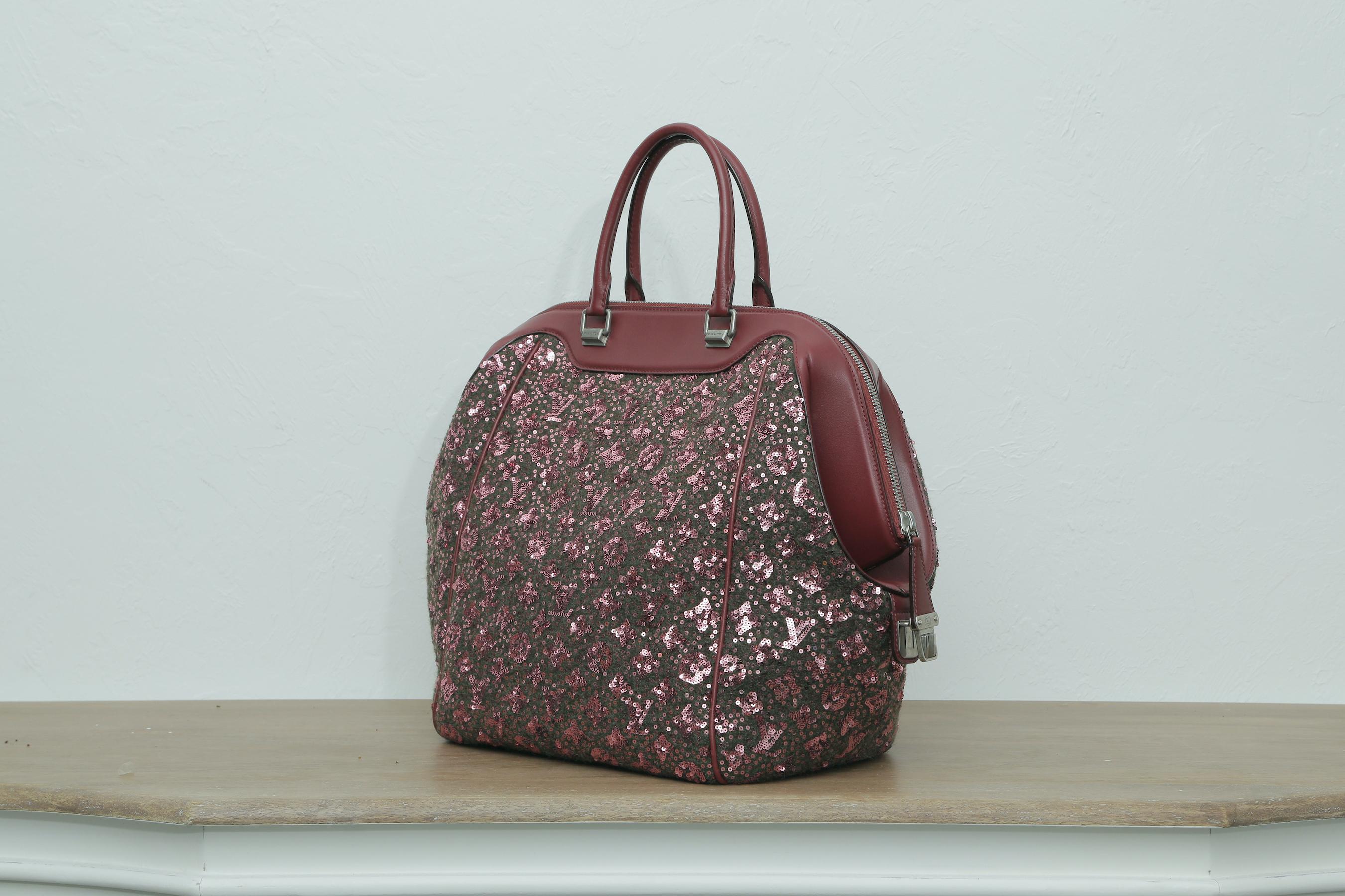 This is a Brand New authentic, Limited Edition LOUIS VUITTON Sequin Monogram Sunshine Express North South in Burgundy. This Louis Vuitton Speedy is entirely covered in sequins embellished with the Louis Vuitton monogram.  The bag features matching