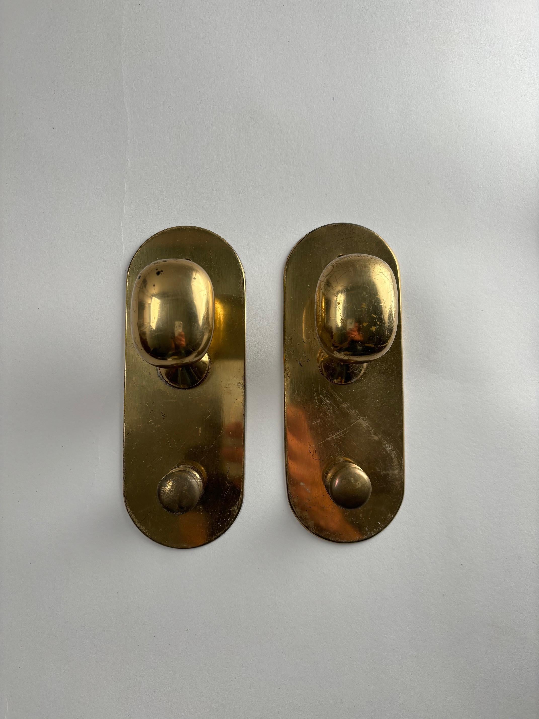 Raro lote de perchas de latón modelo 