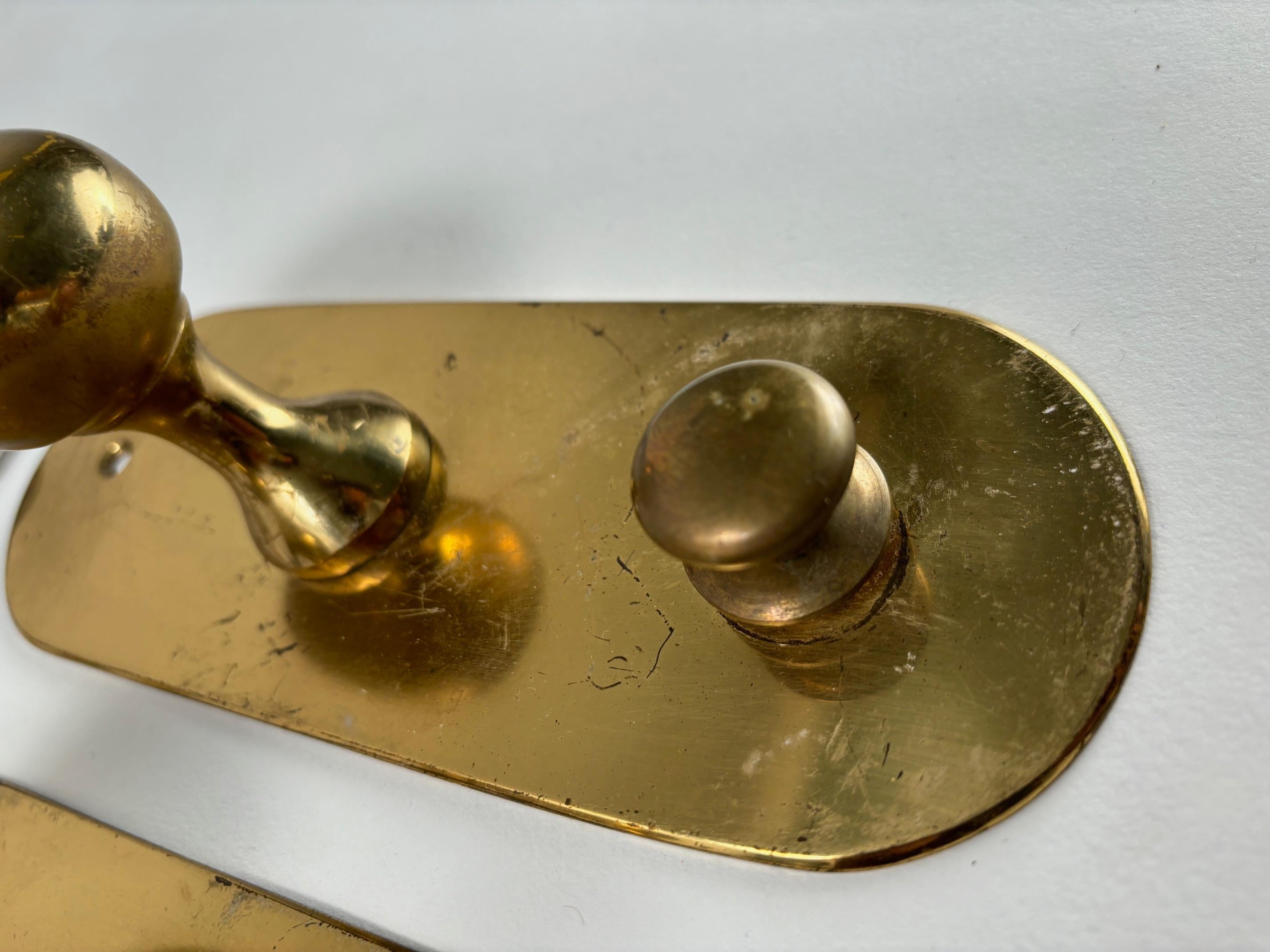 Percha de latón 