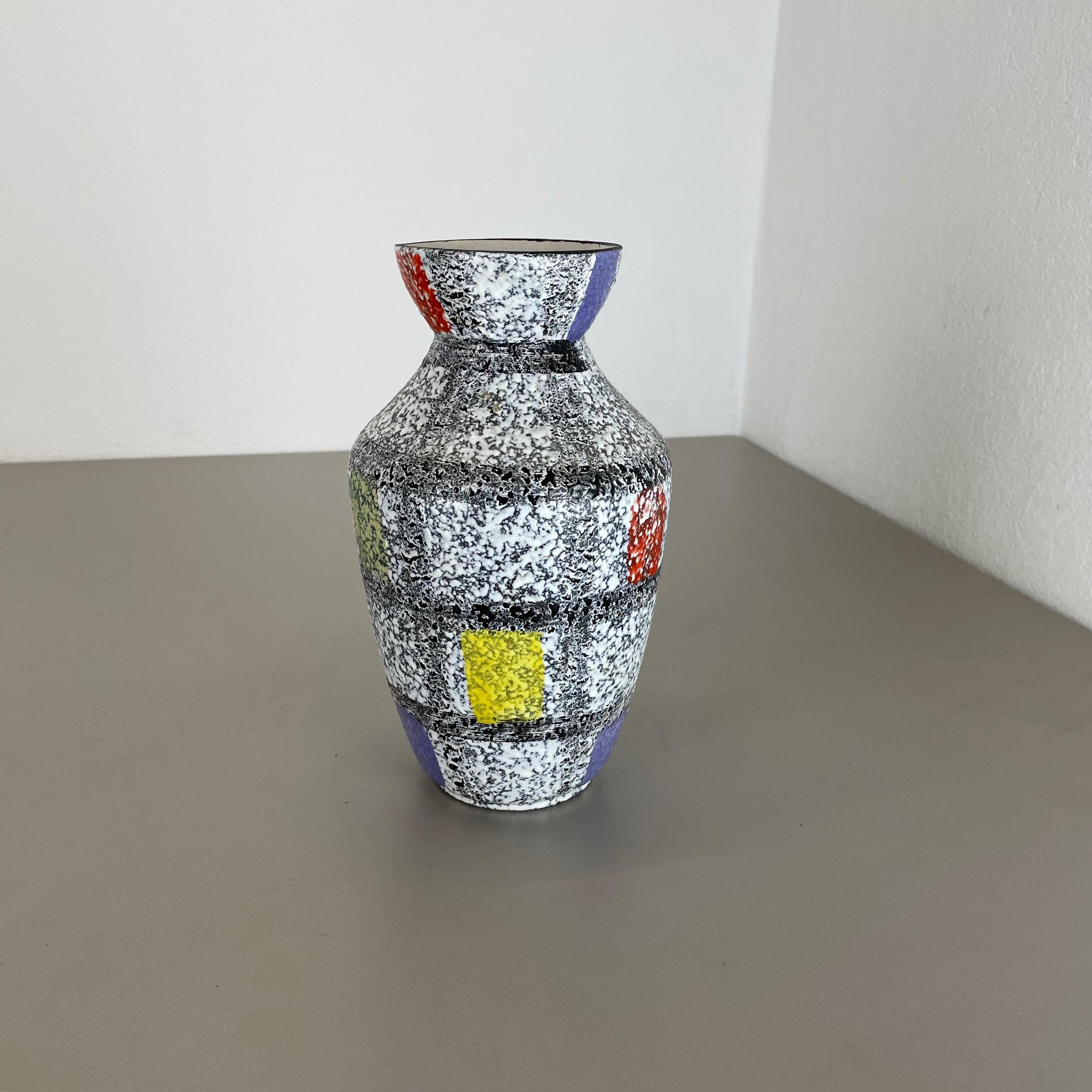 Article:

Pottery ceramic vase


Producer:

BAY Ceramic, Germany



Decade:

1950s




Original vintage 1950s pottery ceramic vase made in Germany. High quality German production with a nice abstract painting and super colorful