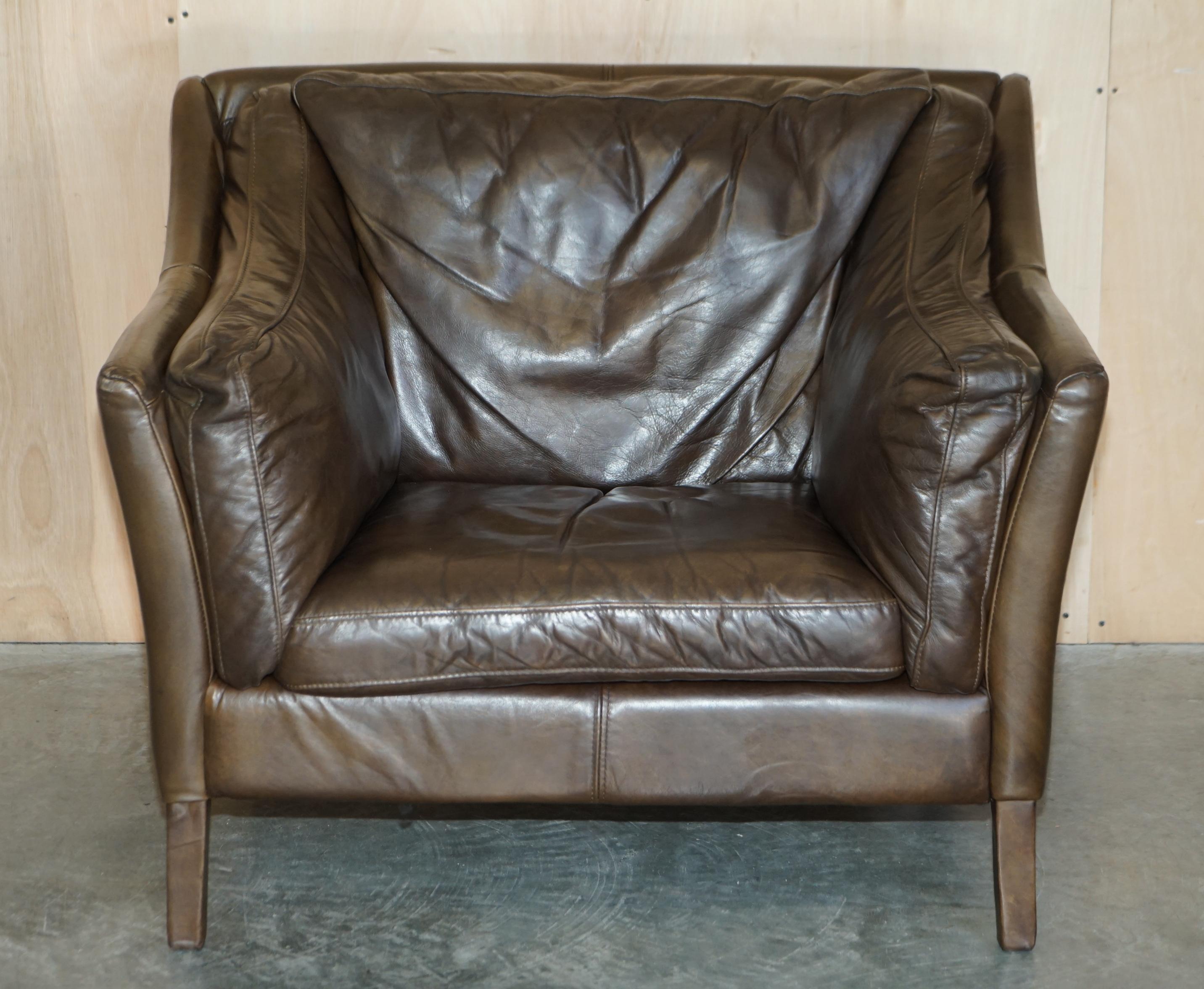 We are delighted to offer for sale this very comfortable Halo Reggio brown leather club armchair

A good looking and well made piece, it is super comfortable, stylish and finished in a nice cigar saddle brown

We have cleaned waxed and polished