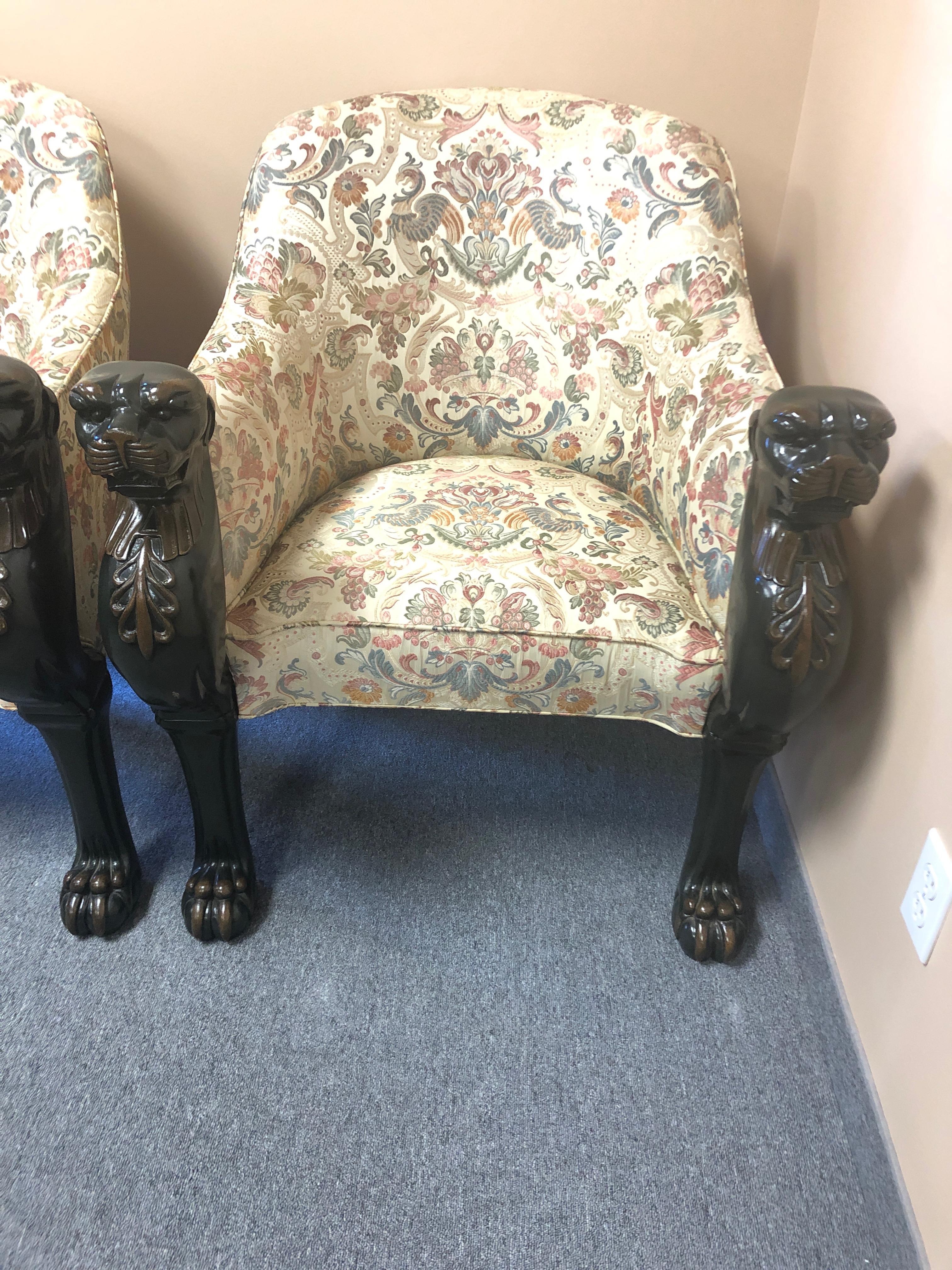 Very impressive pair of Baker Stately Homes' Vert-de-Bronze Green and gilt decorated tub or club chairs having hand carved leopard masks continuing into lifelike clawed and padded feet.  In the Egyptian style, the design goes back to the Duke of