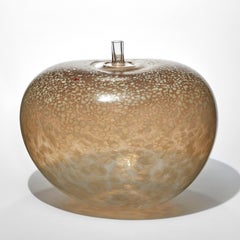 Super Egg Latte, a milky fawn & golden brown glass sculpture by Bertil Vallien