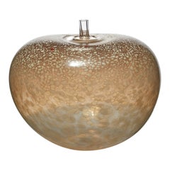 Super Egg Latte, a milky fawn & golden brown glass sculpture by Bertil Vallien