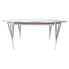 Tavolo da pranzo Super Ellipse con laminato bianco disegnato da Piet Hein dal 2011