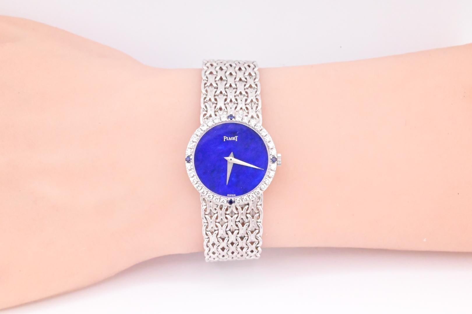 This stunning Piaget ladies watch is a must-have for any jewelry collection. Crafted from 18K white gold, this wristwatch features an analog display and a gorgeous Lapis dial that is sure to catch the eye. With its sleek and stylish design, this