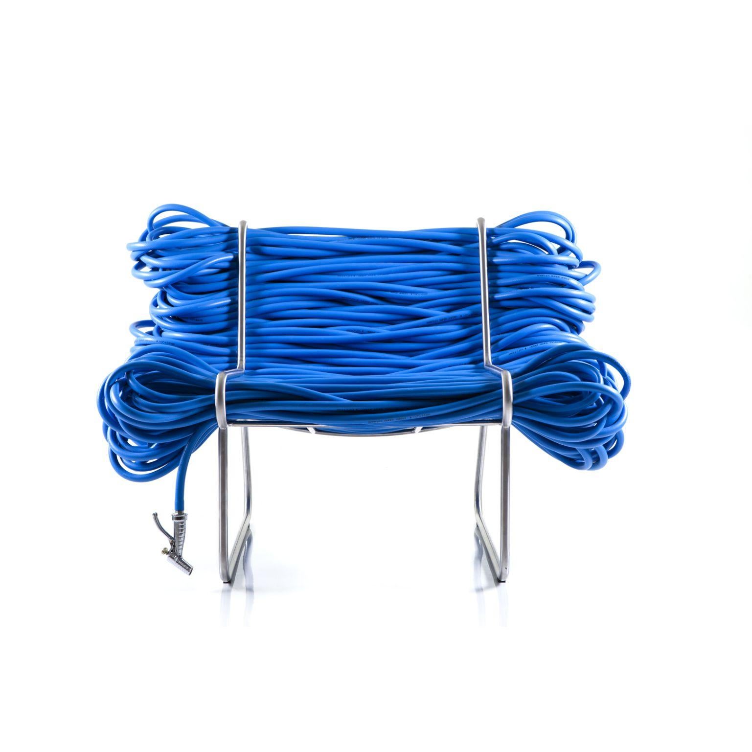 Super Jardim - Blue armchair by Cultivado Em Casa
Dimensions: 105 x 80 x 73 cm
Materials: Stainless steel, PVC hose, nozzle and faucet

Also available: green, red, black, yellow,

Using a 200-meter continuous garden hose, with a faucet at one