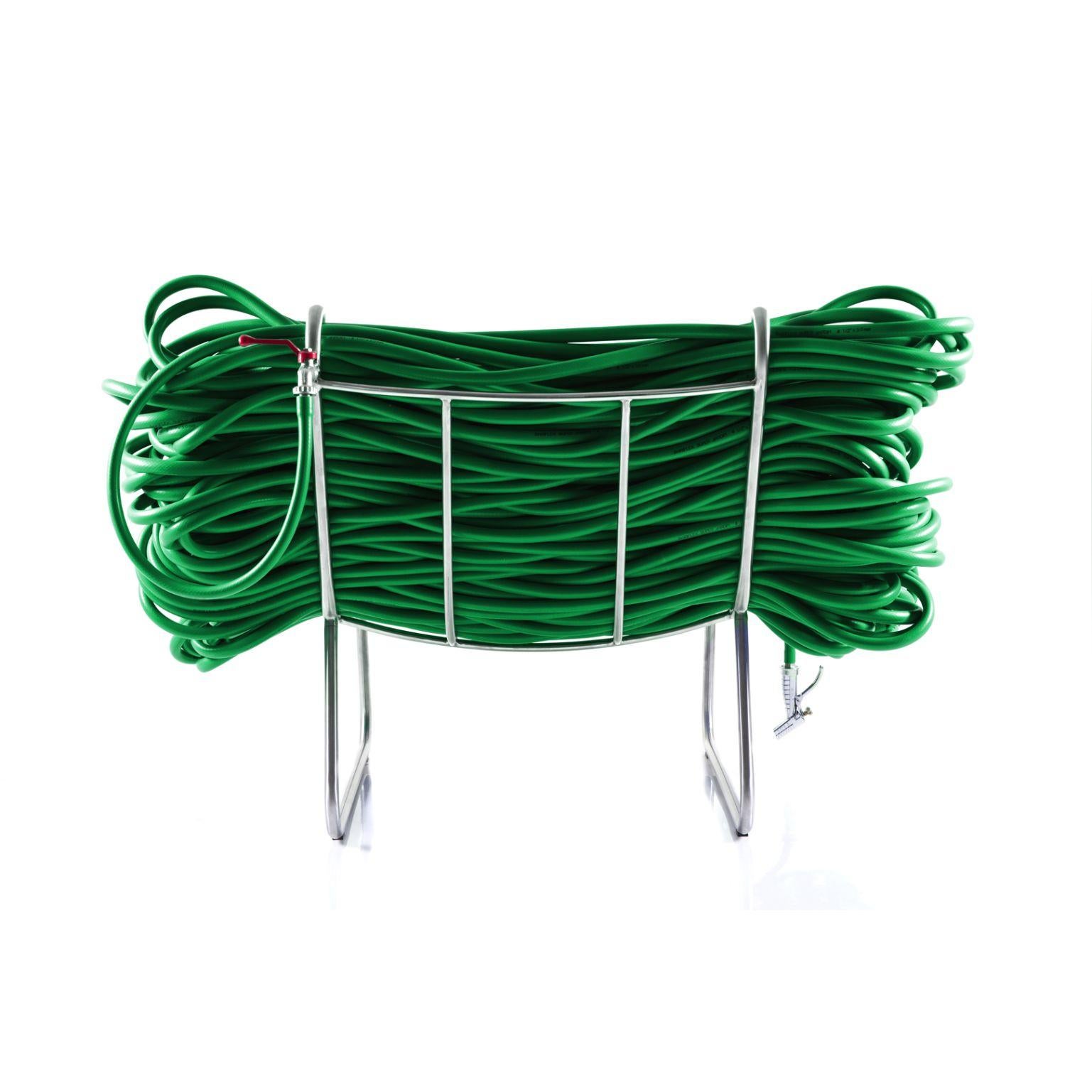 Super Jardim - Green armchair by Cultivado Em Casa
Dimensions: 105 x 80 x 73 cm
Materials: Stainless steel, PVC hose, nozzle and faucet

Also available: blue, red, black, yellow

Using a 200-meter continuous garden hose, with a faucet at one