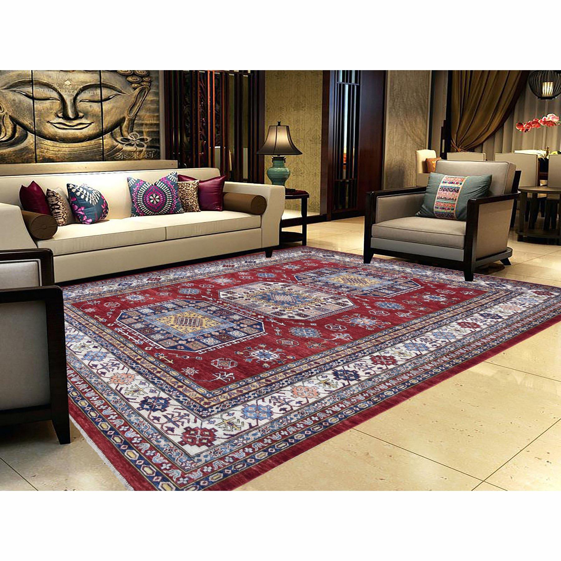 This is a truly genuine one-of-a-kind super Kazak pure wool red geometric design hand knotted Oriental rug. It has been knotted for months and months in the centuries-old Persian weaving craftsmanship techniques by expert artisans. Measures: 8'0