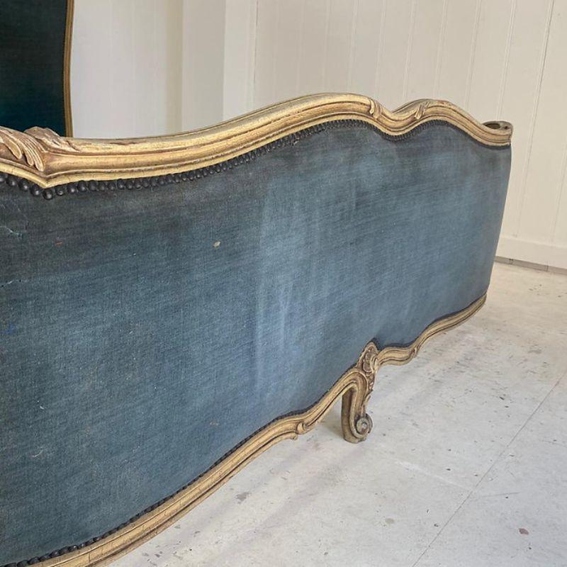 A good quality heavy antique French bed (6' wide) that is awaiting full restoration. The frame can be painted to your choice of colour and upholstered in your chosen fabric. High quality intricate carvings on the feet. The frame will be finished