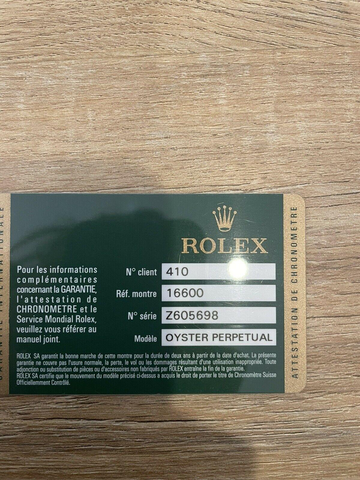 Women's or Men's Super Mint Rolex 16600 Sea-Dweller Black Dial Men's Watch Box & Paper For Sale