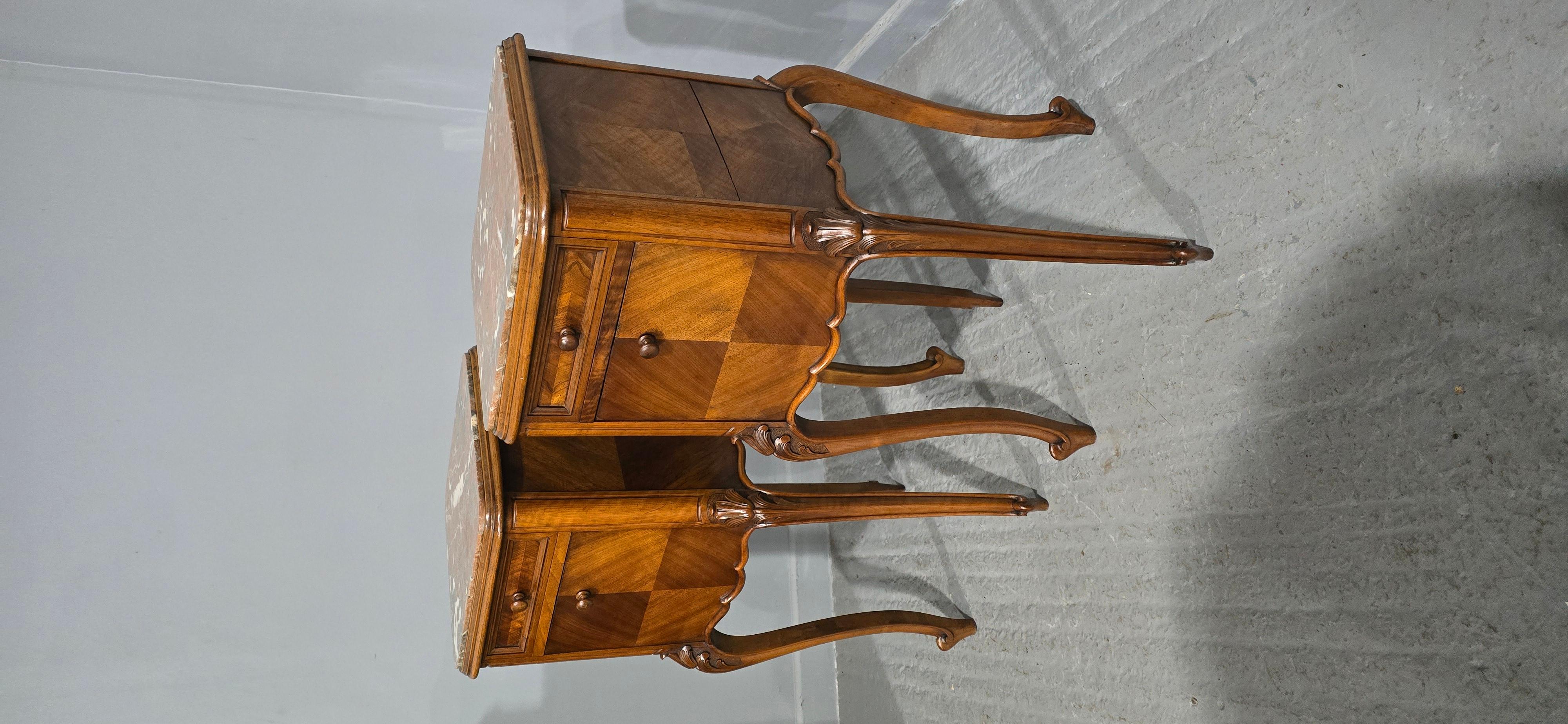 Super pair French walnut bedside lamp tables, drop down fronts, white marble interiors, rouge marble tops, in very good original condition.

35