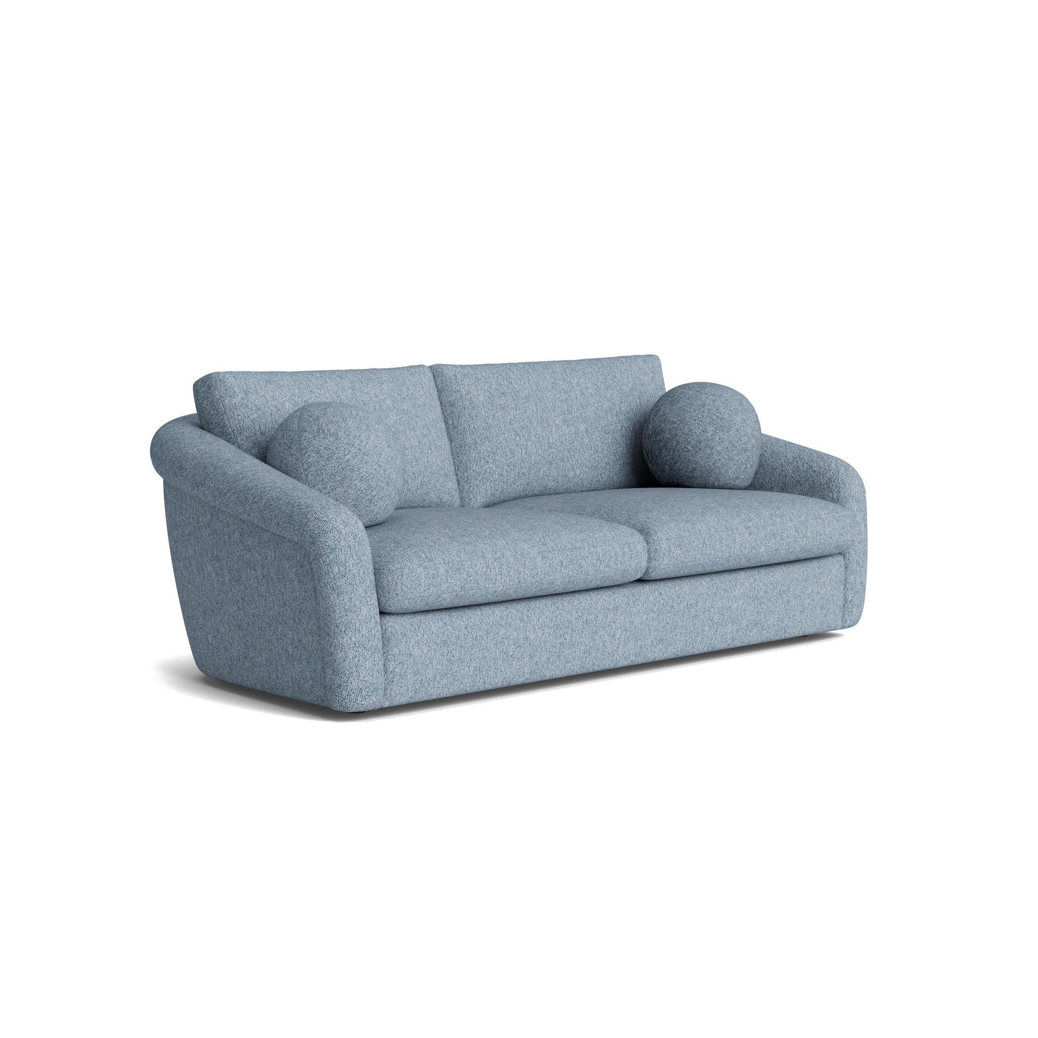 This sofa's deep, ultra-plush cushions invite you to sink in, while the soft, organic curves and gently arched back add an elegant touch to any space. Crafted with the highest quality, it features 8-way hand-tied suspension and reversible