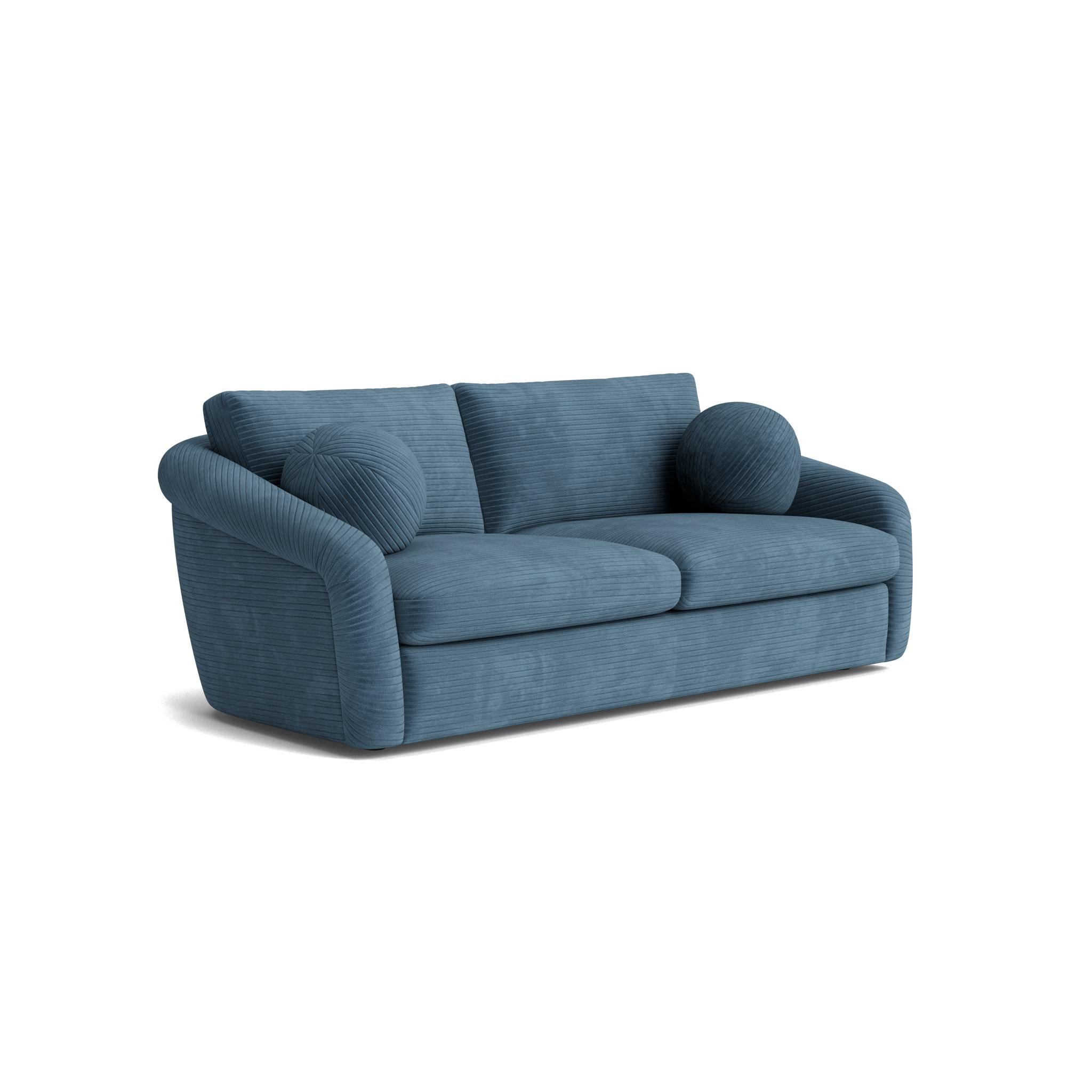 This sofa's deep, ultra-plush cushions invite you to sink in, while the soft, organic curves and gently arched back add an elegant touch to any space. Crafted with the highest quality, it features 8-way hand-tied suspension and reversible