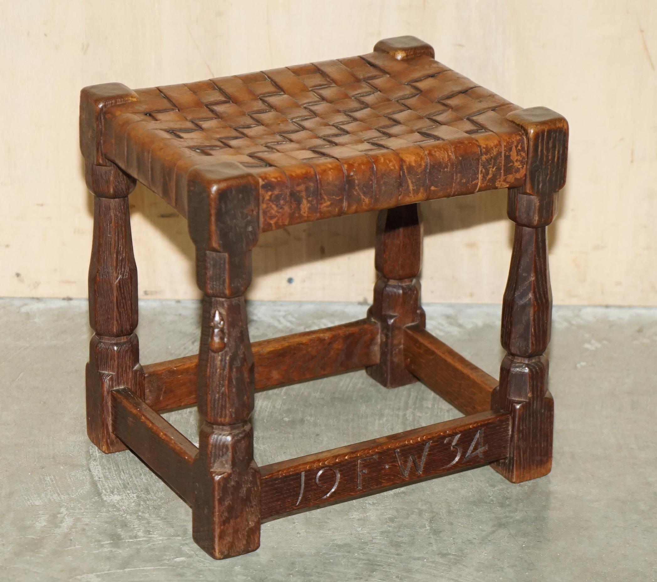 Royal House Antiques

Royal House Antiques is delighted to offer for sale this stunning 1934 dated Robert Mouseman Thompson leather woven footstool in sublime period condition

A good looking and functional small footstool, the ideal size for one