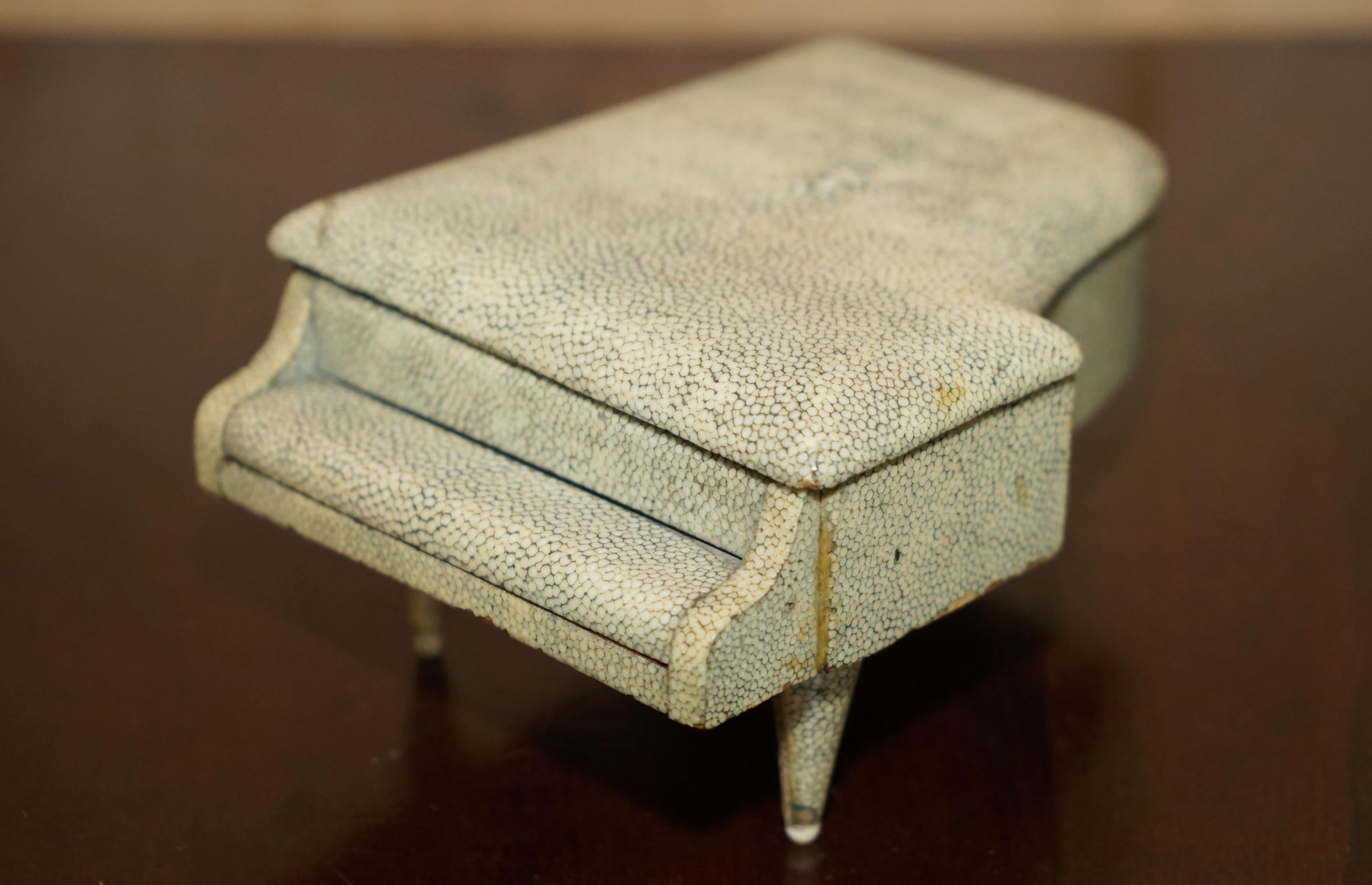 Royal House Antiques is delighted to offer for sale this super rare, highly collectable, Antique Victorian circa 1880, Shagreen & Burr Walnut Piano Musical Jewellery box

What a thing! Have you ever seen a better example of this type of box!