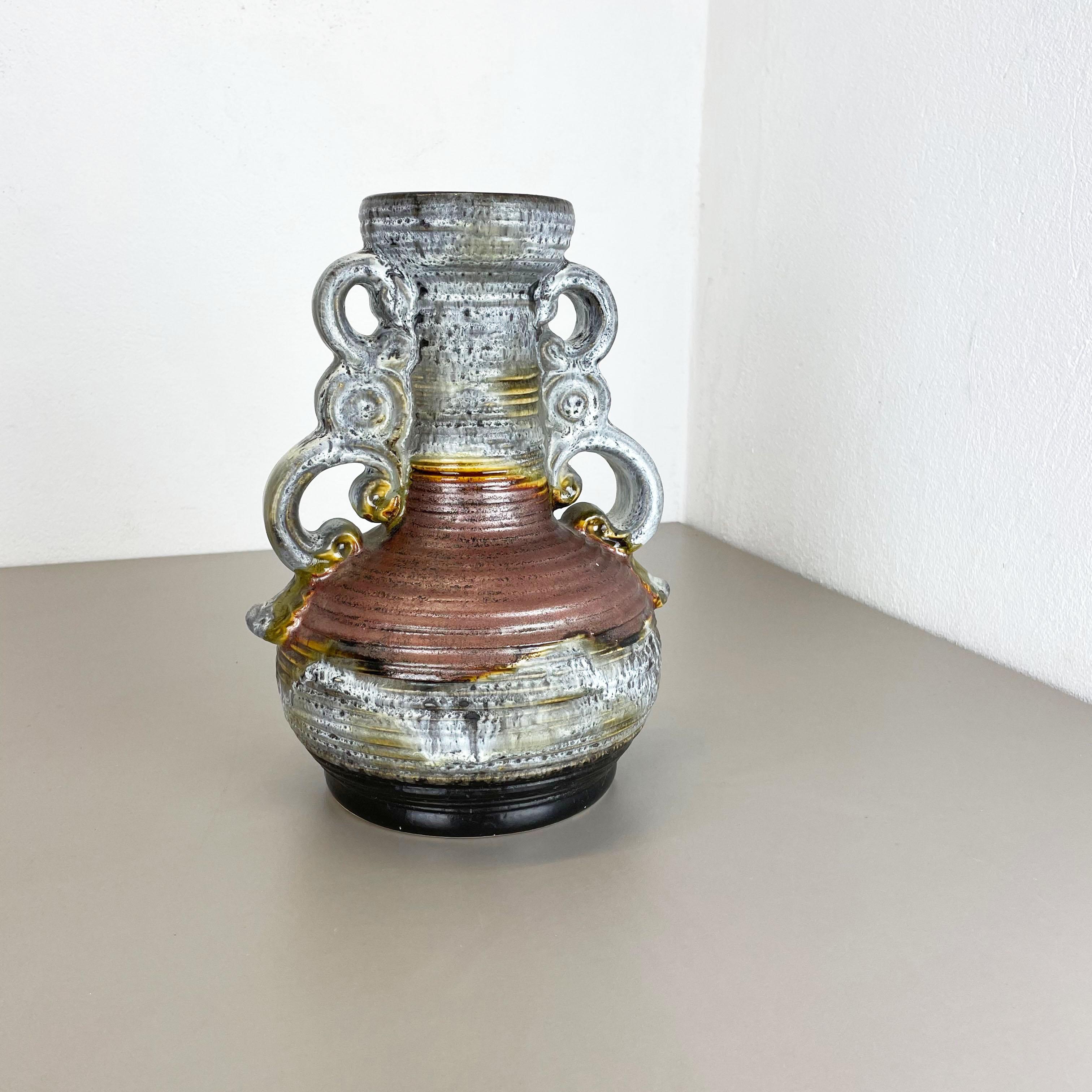 Article:

Pottery ceramic vase 


Producer:

Dümmler and Breiden, Germany


Decade:

1970s



Description:

Original vintage 1970s pottery ceramic vase made in Germany. High quality German production with a nice abstract