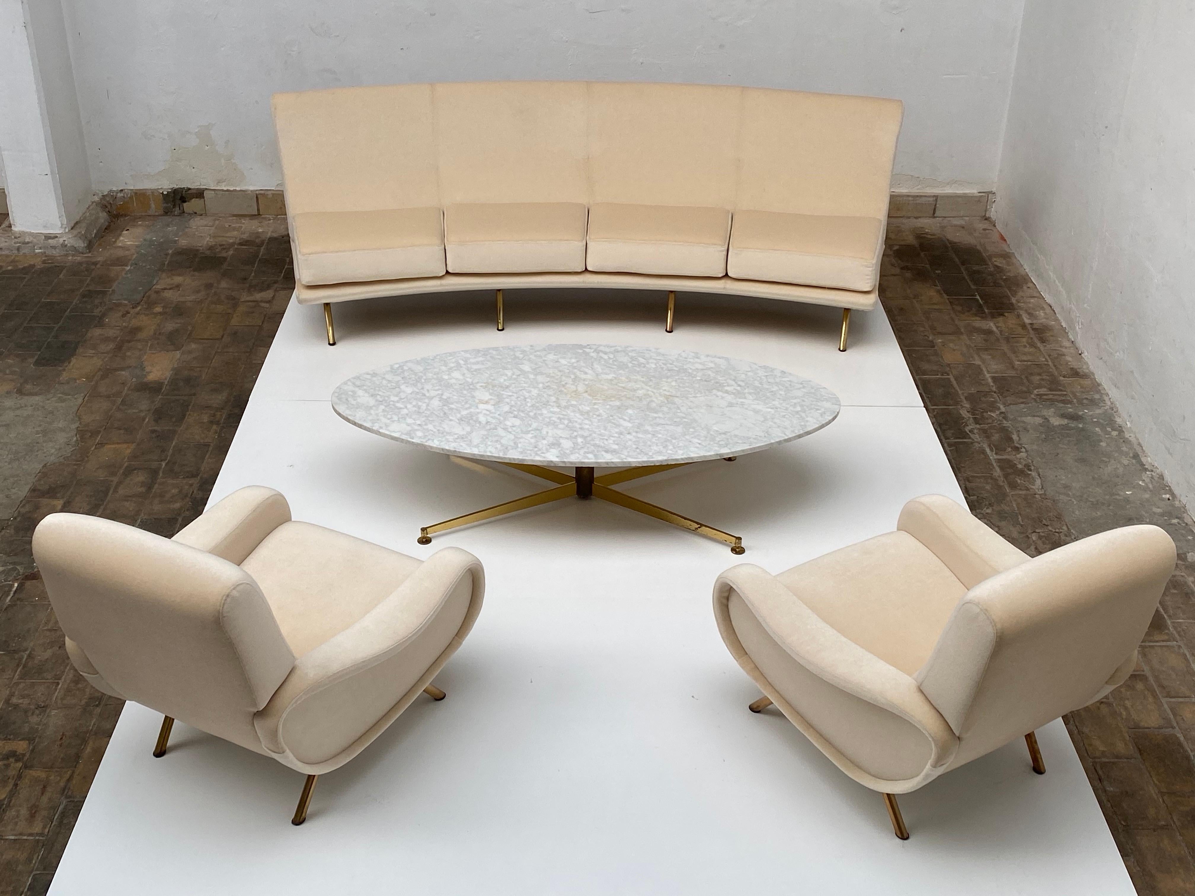 Extremely rare four-seat model of Marco Zanuso's 1951 elliptical ' IX Triennale' sofa with brass legs. The design was named after the 9th Triennale design exhibition held in Milan in 1i951 where the design was first exhibited. 

The sofa's