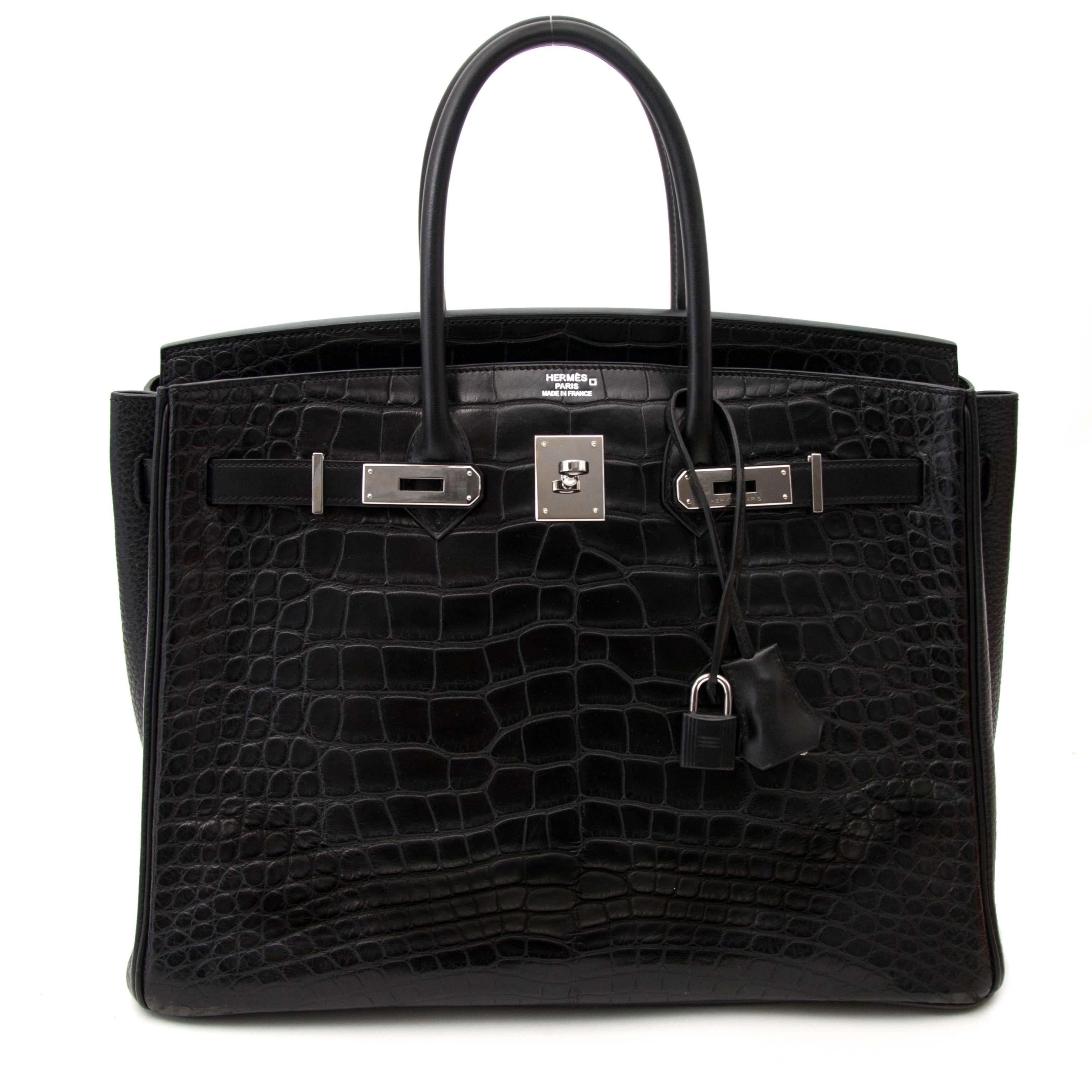 Super Rare Hermes Black Birkin 35 Three Skin (Alligator, Clemence Taurillon, Box Calf)

Breathtaking this Highly Collectible Hermès Black Birkin Bag .
All Birkins and Kellys are very hard to secure, but this distinctive version is incredibly rare as