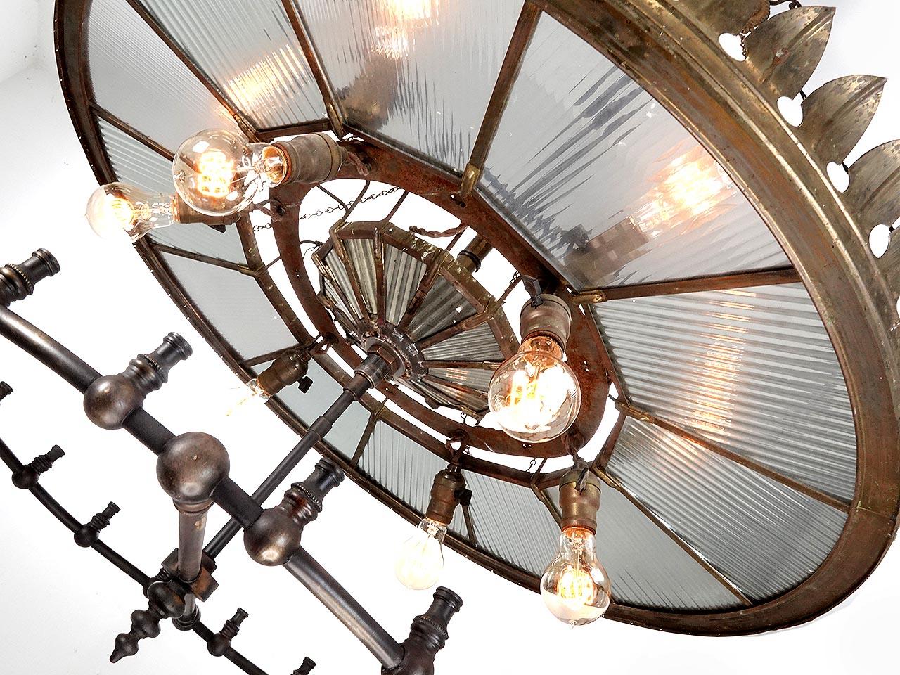 I've been doing this a while and in all the years we have only found one other example of this rare I. P. Frink Reflector. The double mirrored ring of reflectors has a 36 inch diameter. These early mirrored shade fixtures are super rare and