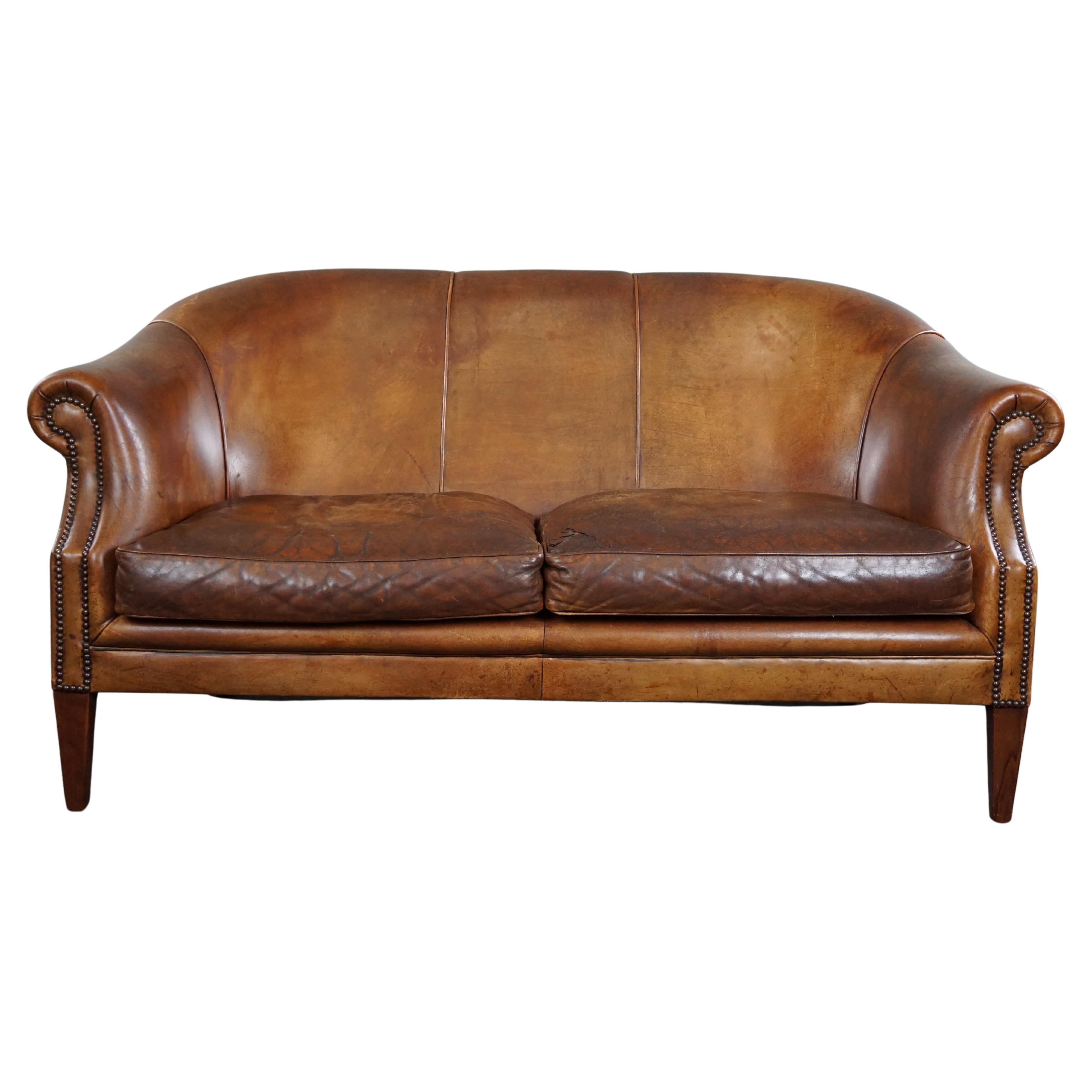 Super rugged vintage sheep leather 2-seater sofa in club style For Sale