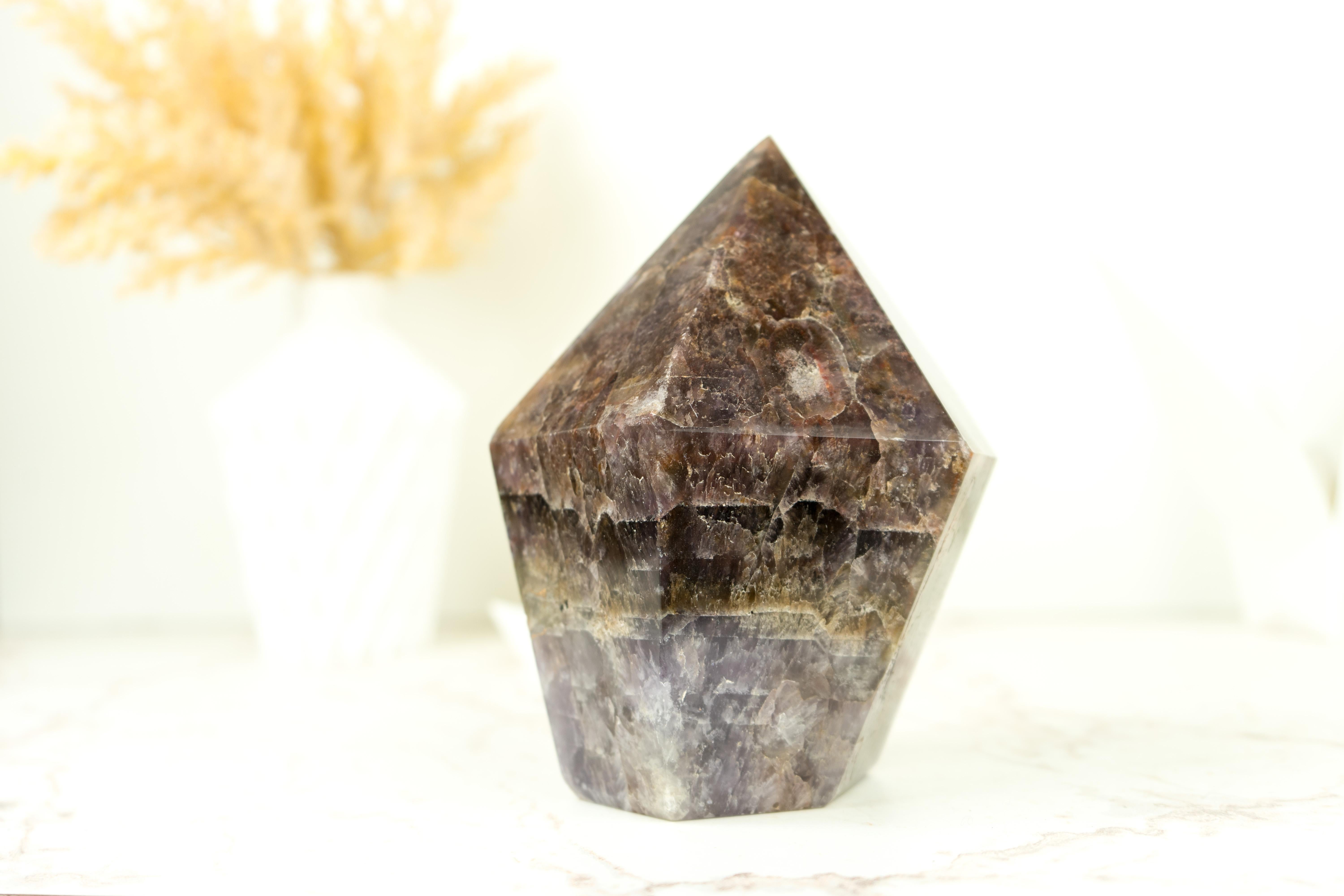 An X-Large Super Seven Scepter Generator, this self-standing point is a remarkable specimen that showcases both impressive size and unique characteristics. This Super 7 crystal is not only a natural wonder but also a desirable addition to any