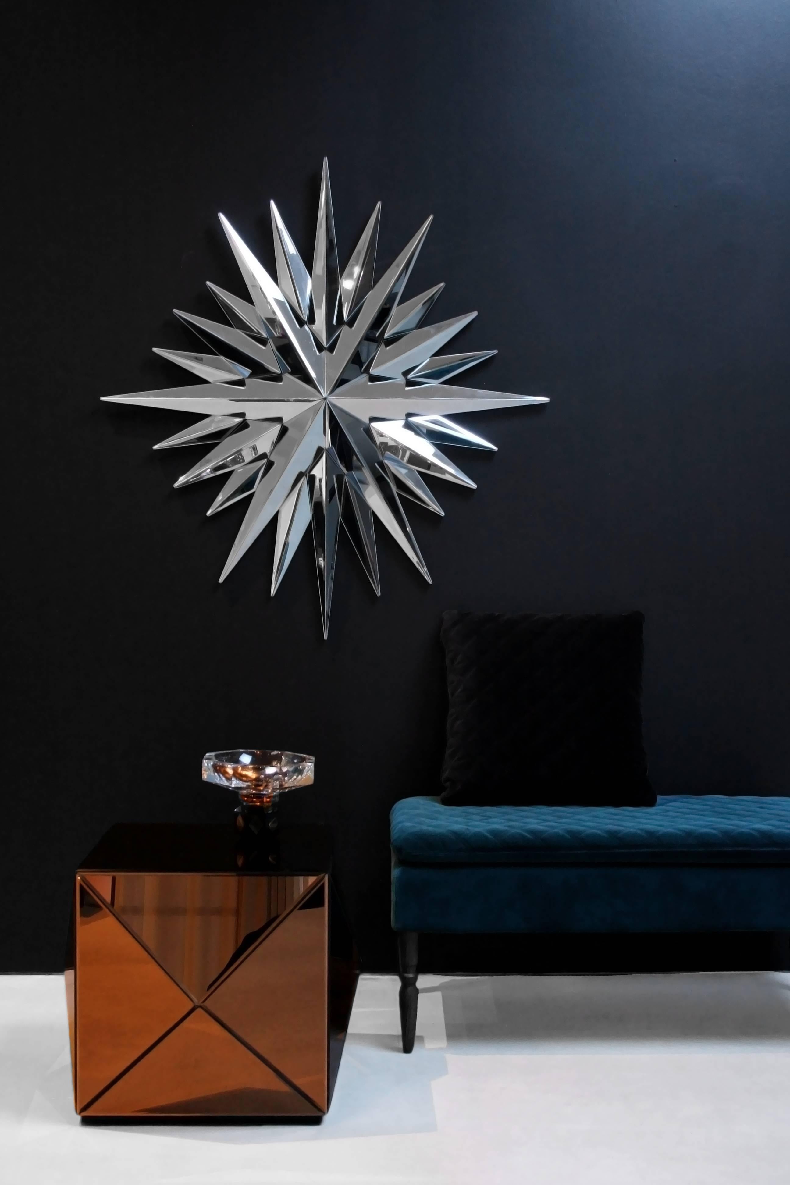 Super Star
Mirror
4mm faceted mirror on black painted mdf
Measures: L 108 x H 116 x D 4.8 cm

The Super Star mirror will reflect the beauty of your space and convey a simply yet dramatic eclectic style to any room.

Reflections Copenhagen, a